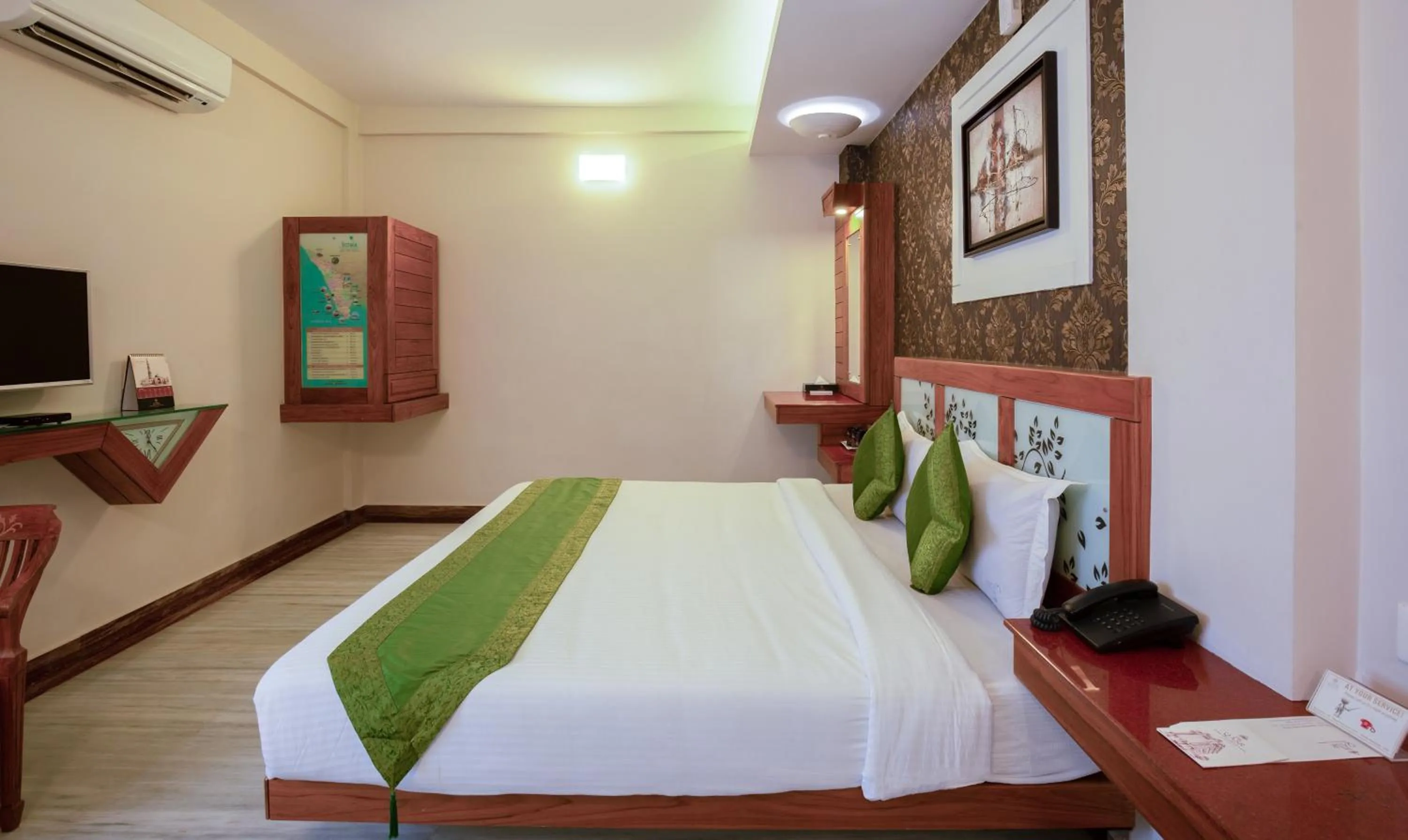 Photo of the whole room, Bed in Treebo The Qasr