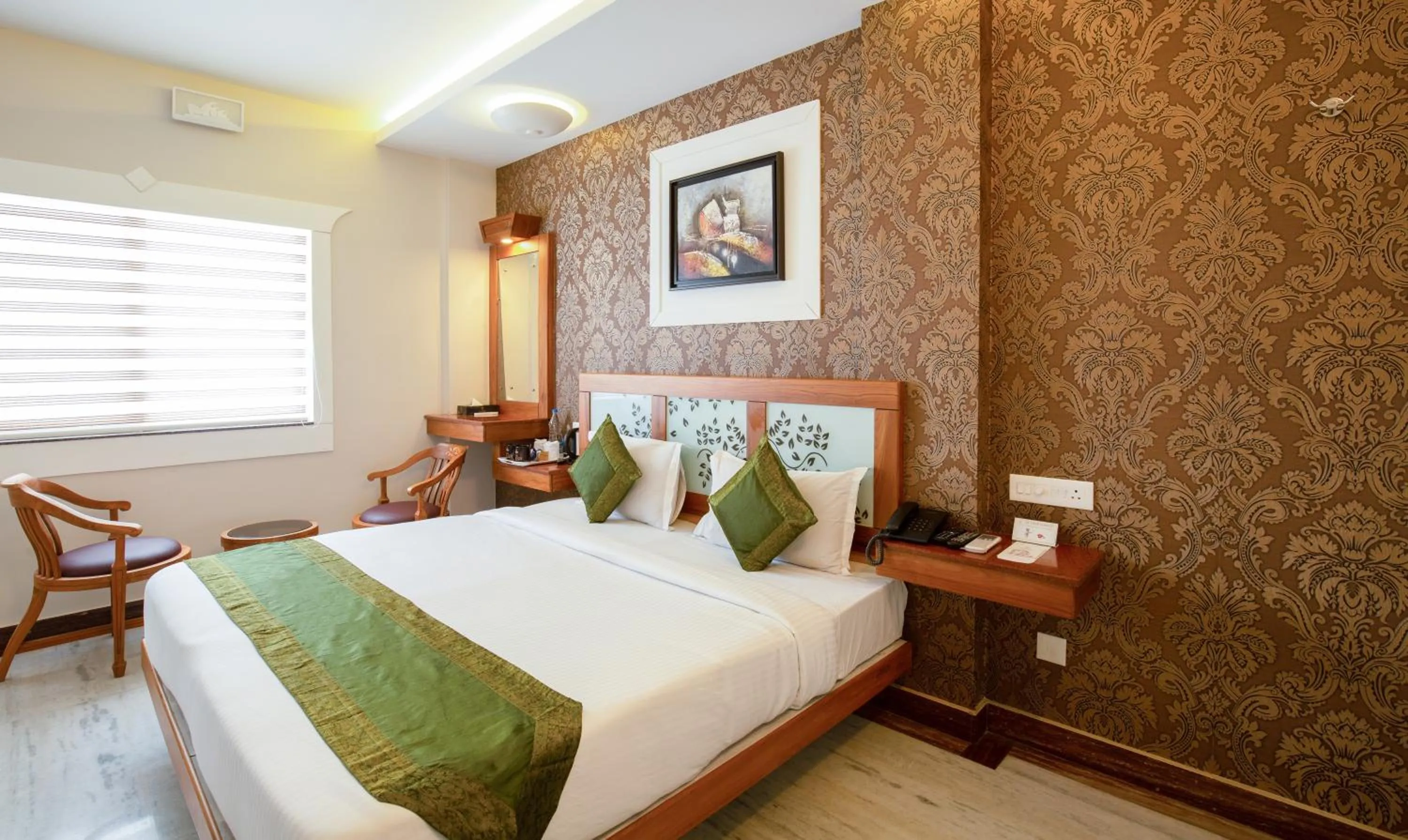 Photo of the whole room, Bed in Treebo The Qasr