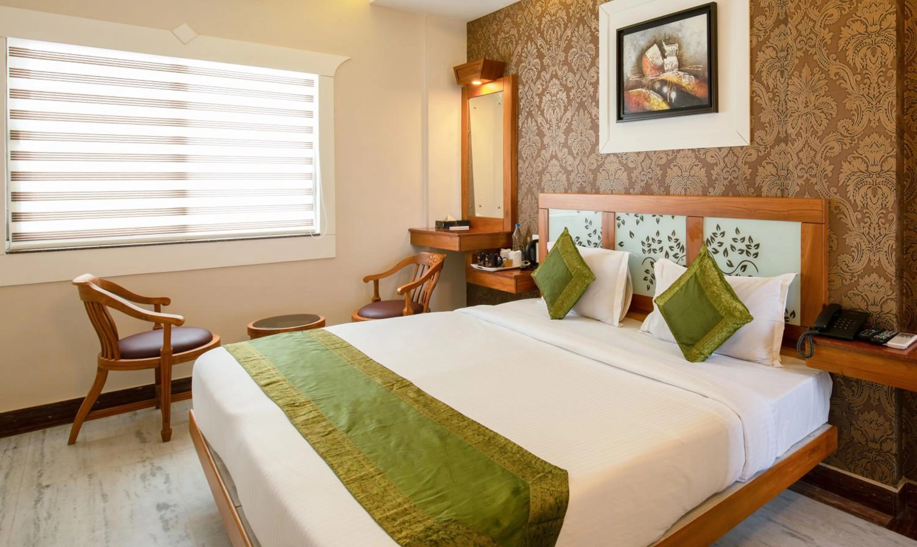 Photo of the whole room, Bed in Treebo The Qasr