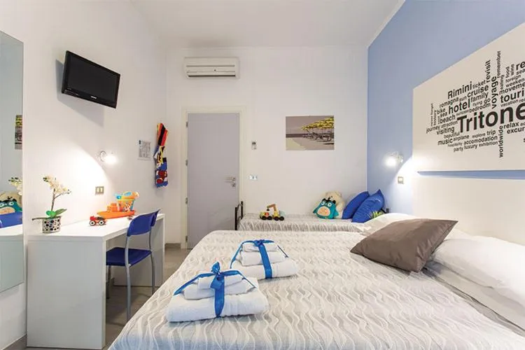 Photo of the whole room, Bed in Hotel Tritone Rimini