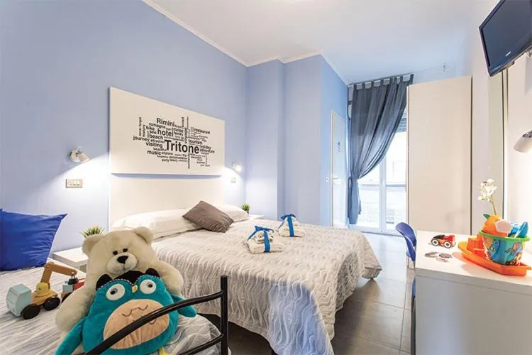 Photo of the whole room, Bed in Hotel Tritone Rimini