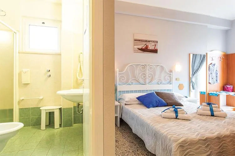 Bed in Hotel Tritone Rimini