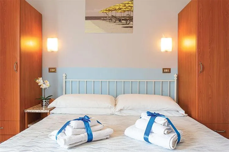Bed in Hotel Tritone Rimini