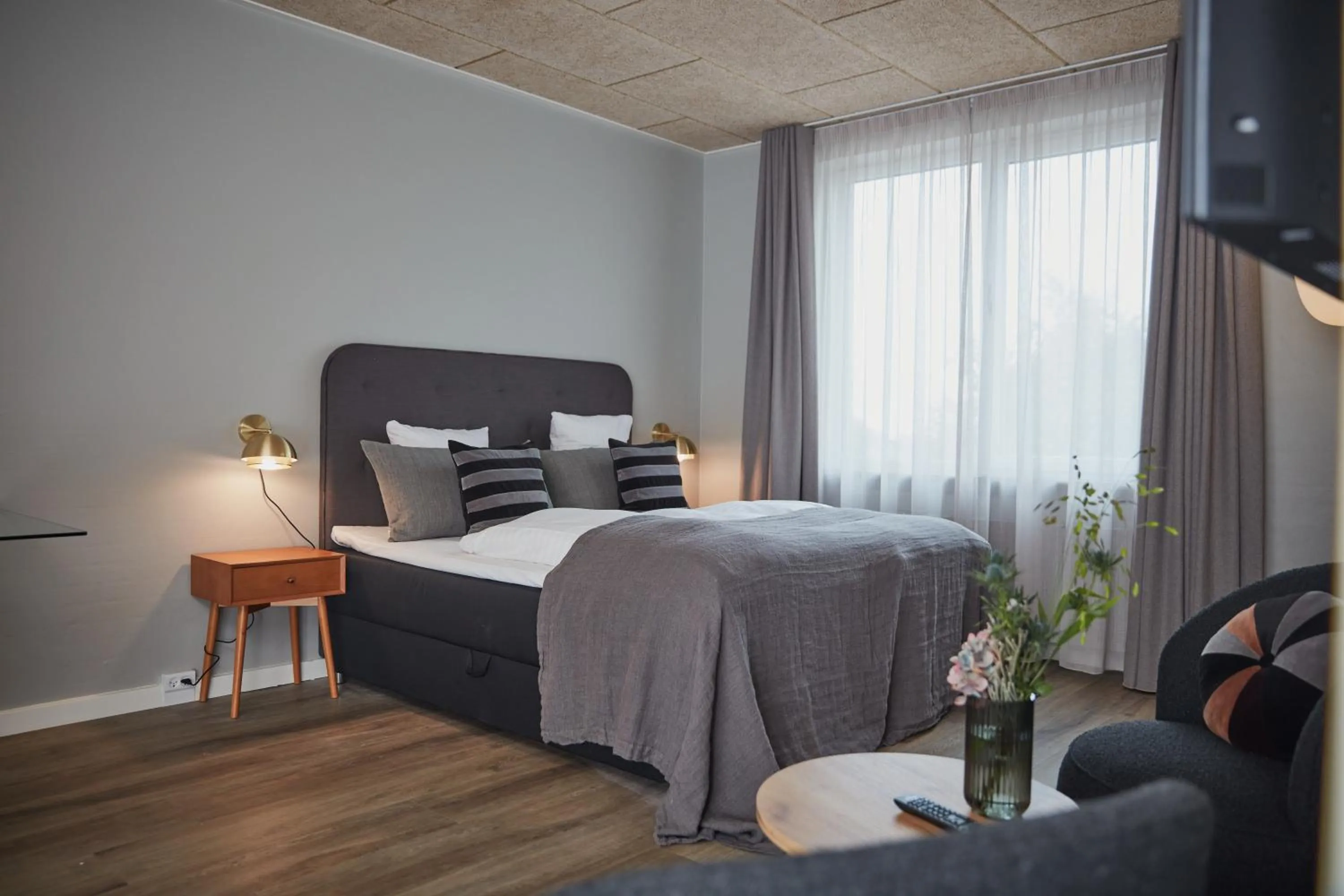 Bed in Benniksgaard Hotel