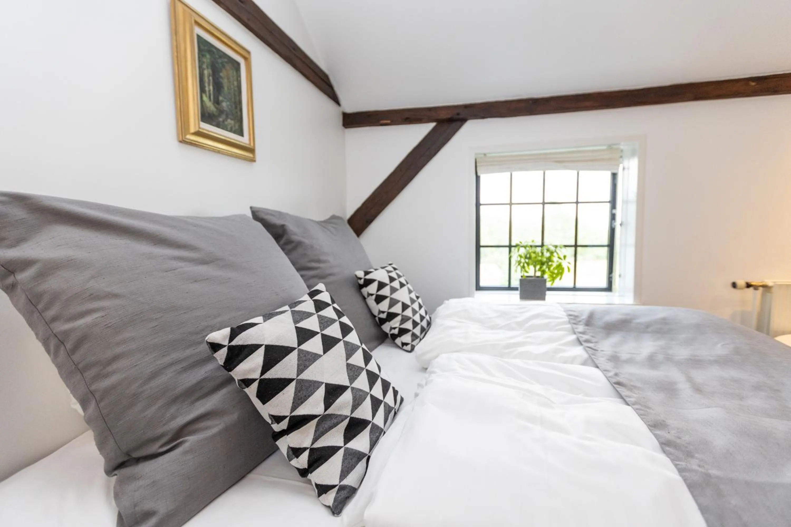 Bed in Benniksgaard Hotel