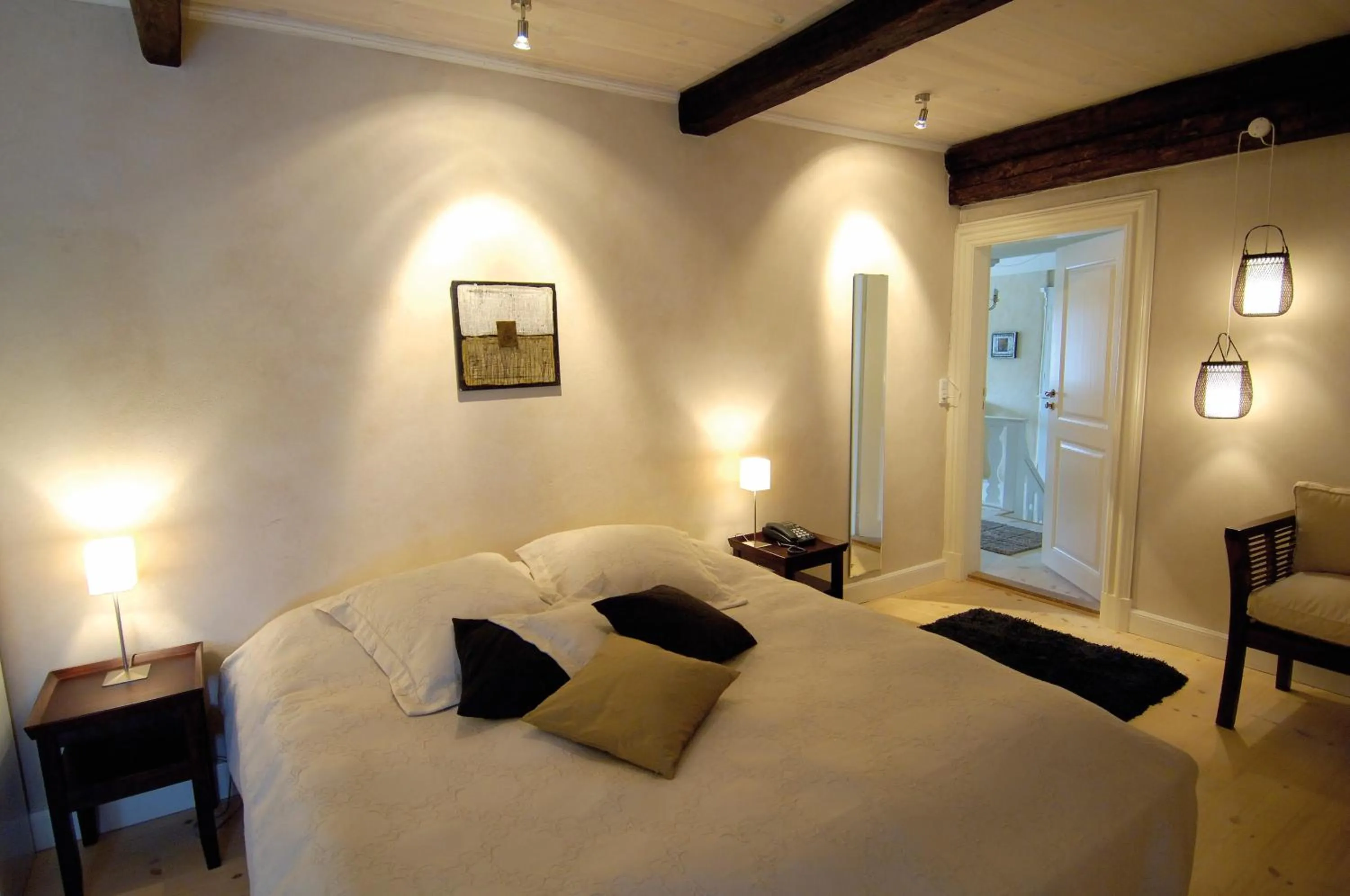 Bed in Benniksgaard Hotel