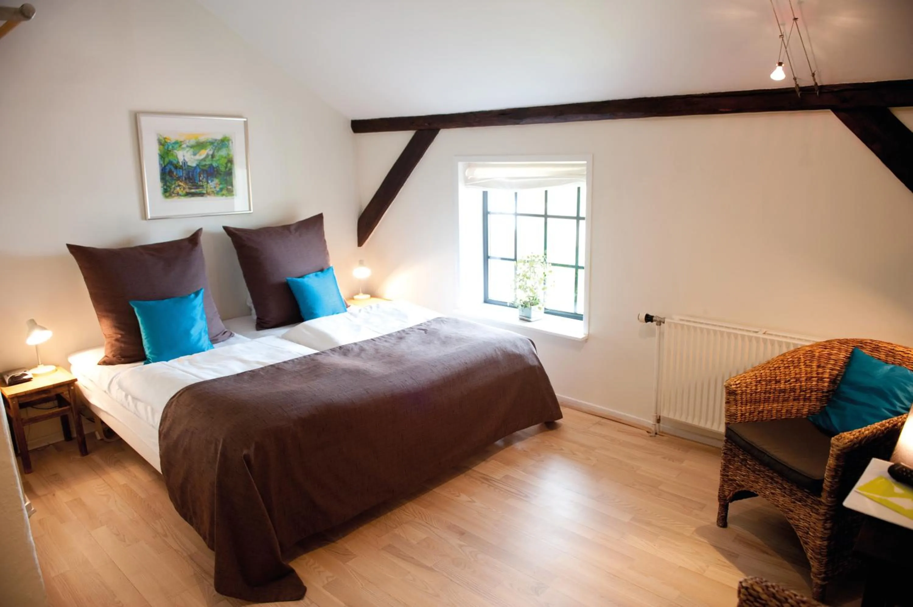 Bed in Benniksgaard Hotel