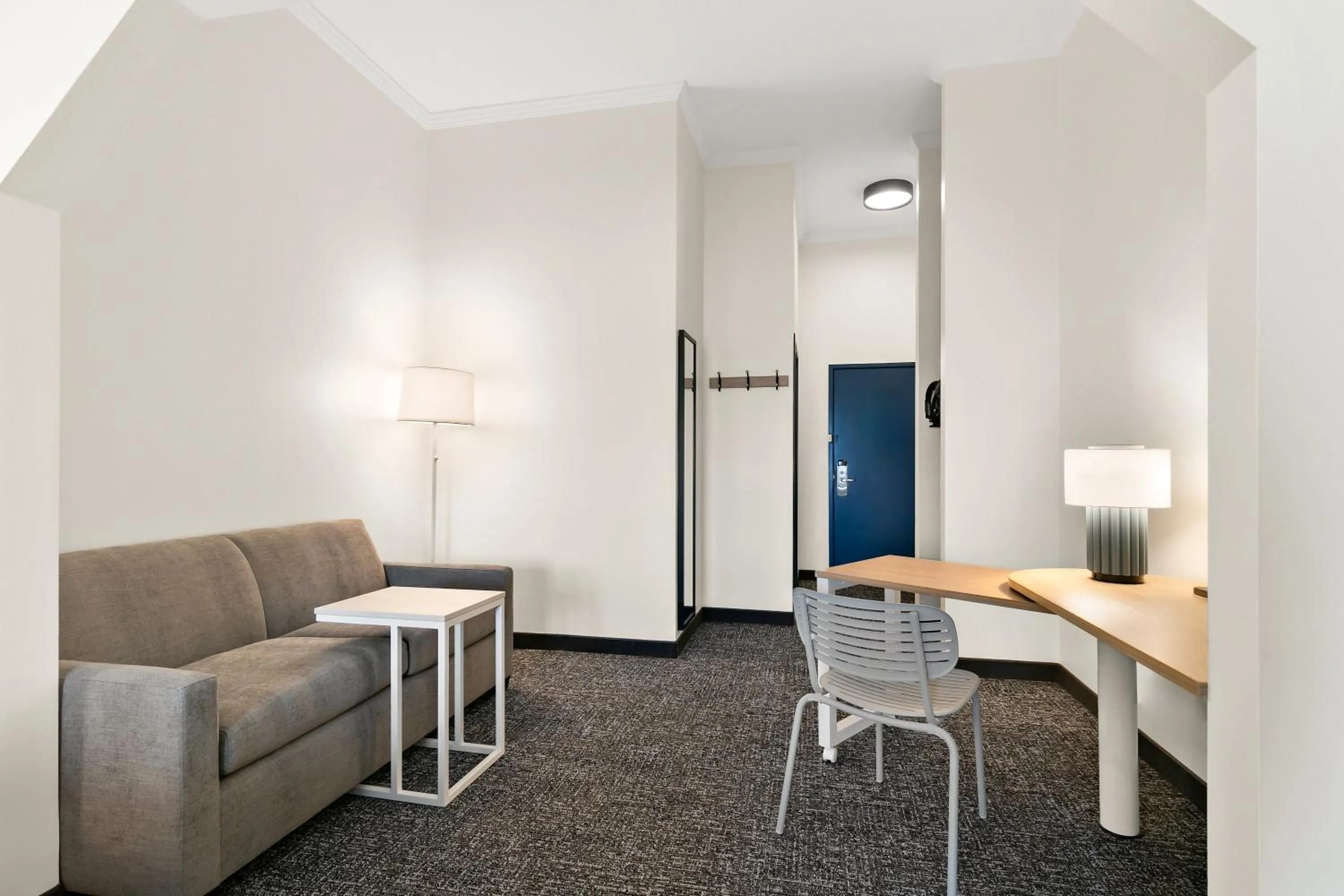 Living room in Spark by Hilton Commerce, GA