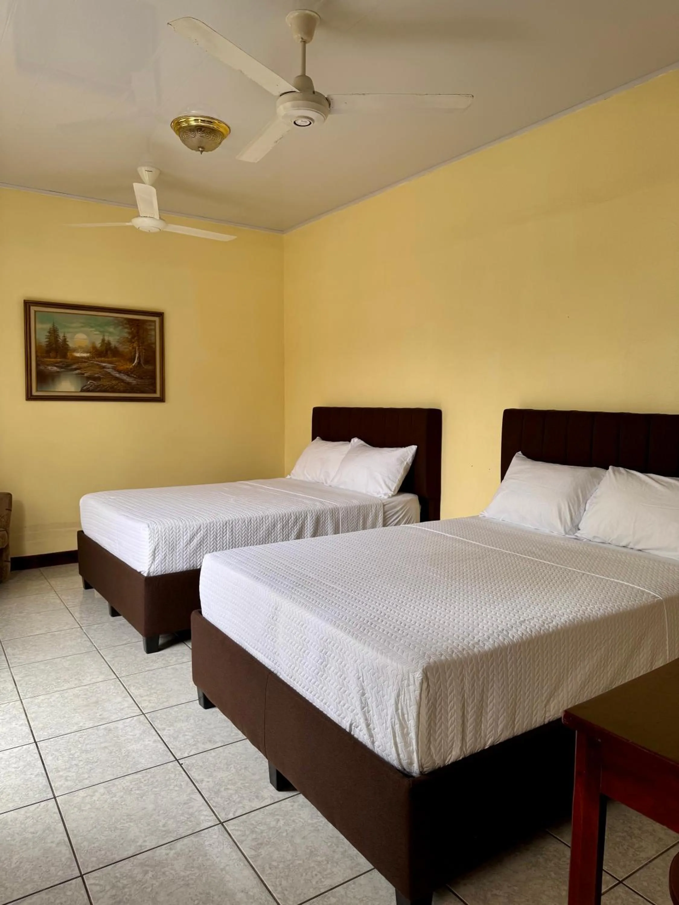 Quadruple Room with Private Bathroom in Hotel Malinche