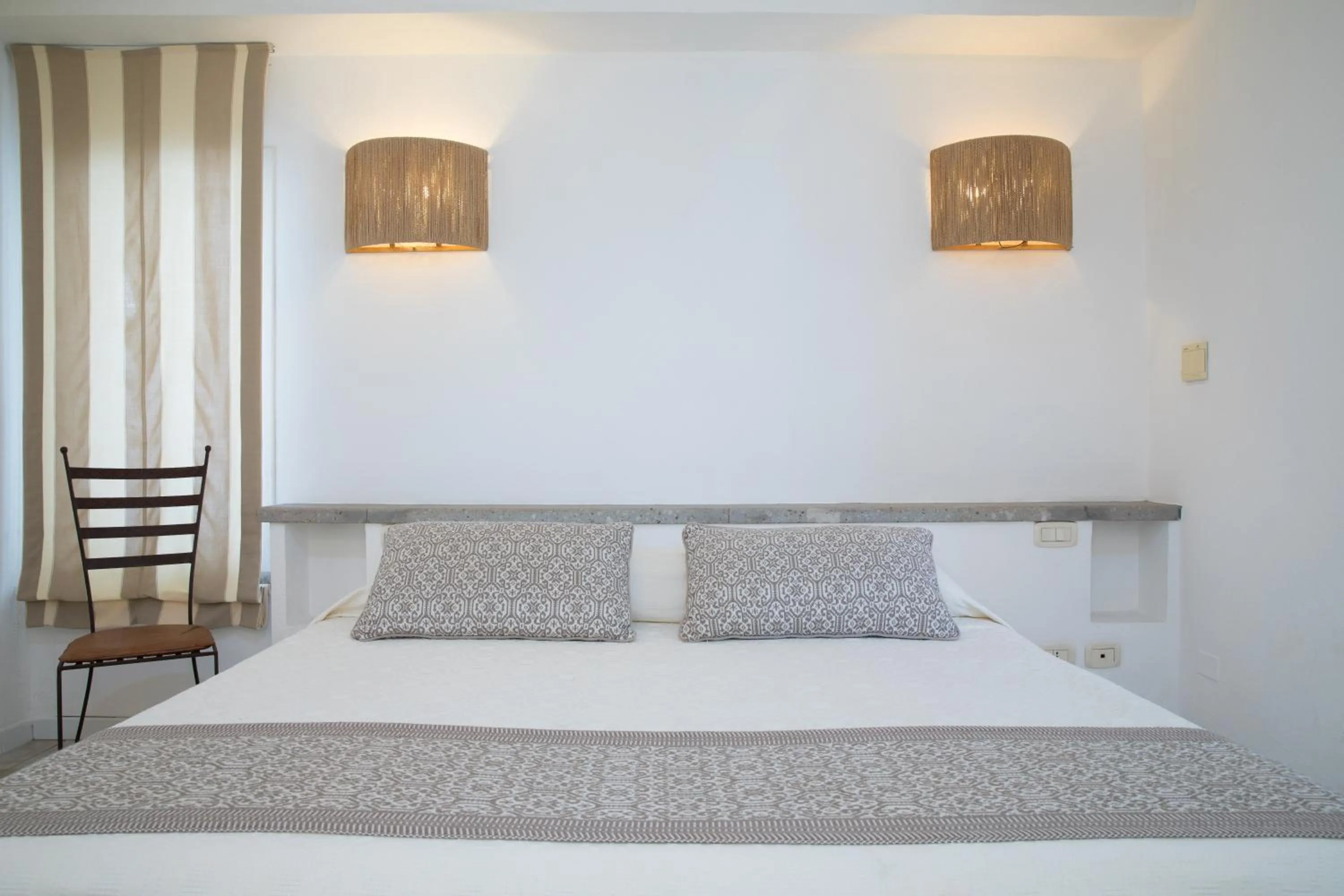 Bed in Hotel Flamingo