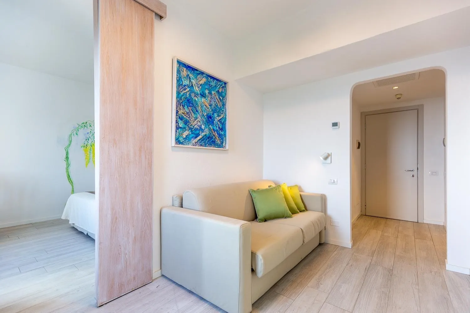 Living room, Bed in Hotel Flamingo