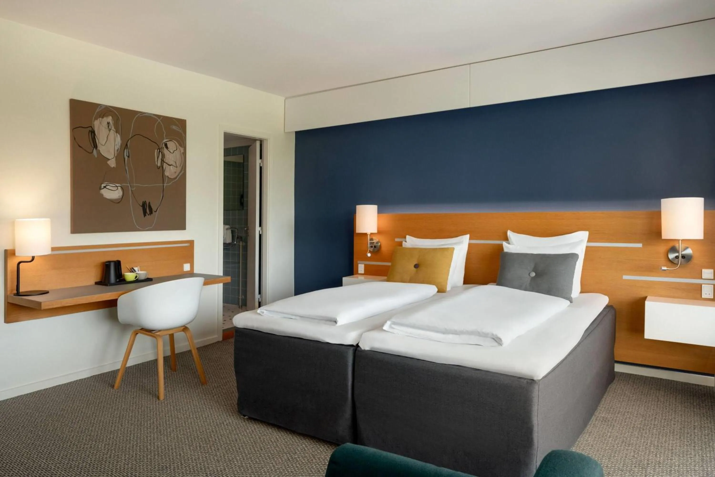 Photo of the whole room, Bed in Comwell Hvide Hus Aalborg, Dolce by Wyndham