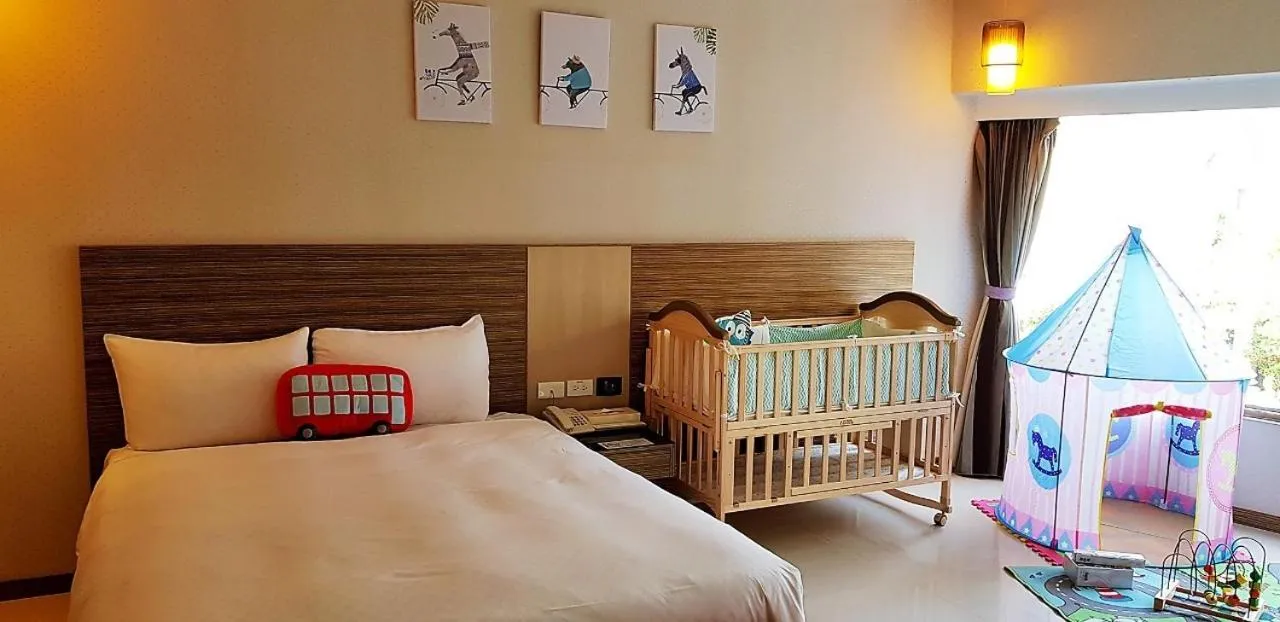 Bed in Esun Villa Hotel