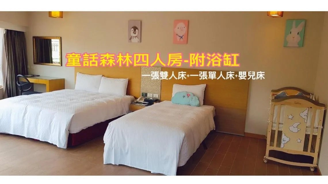 Bed in Esun Villa Hotel