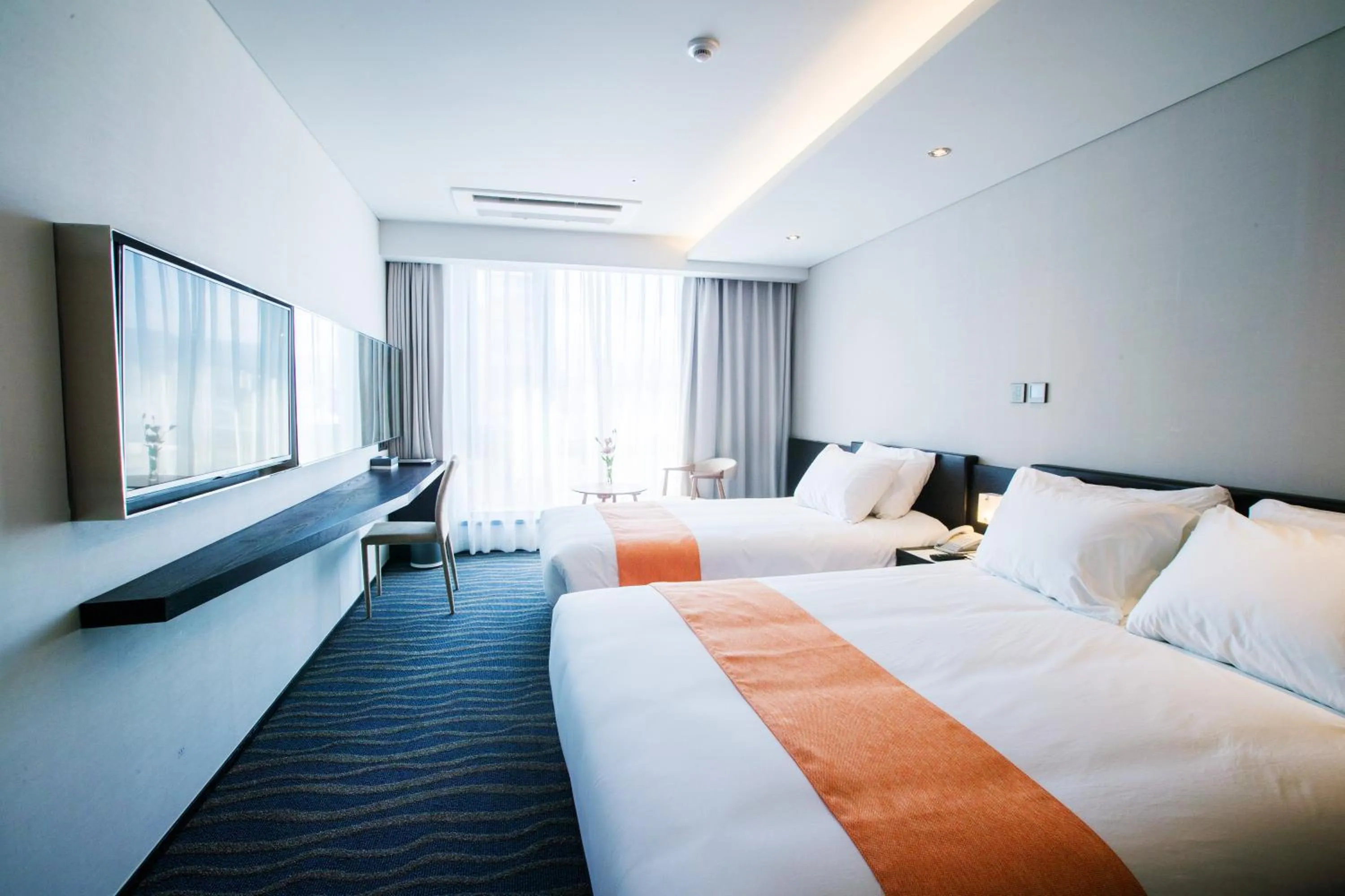 Bed in Gloucester Hotel Jeju