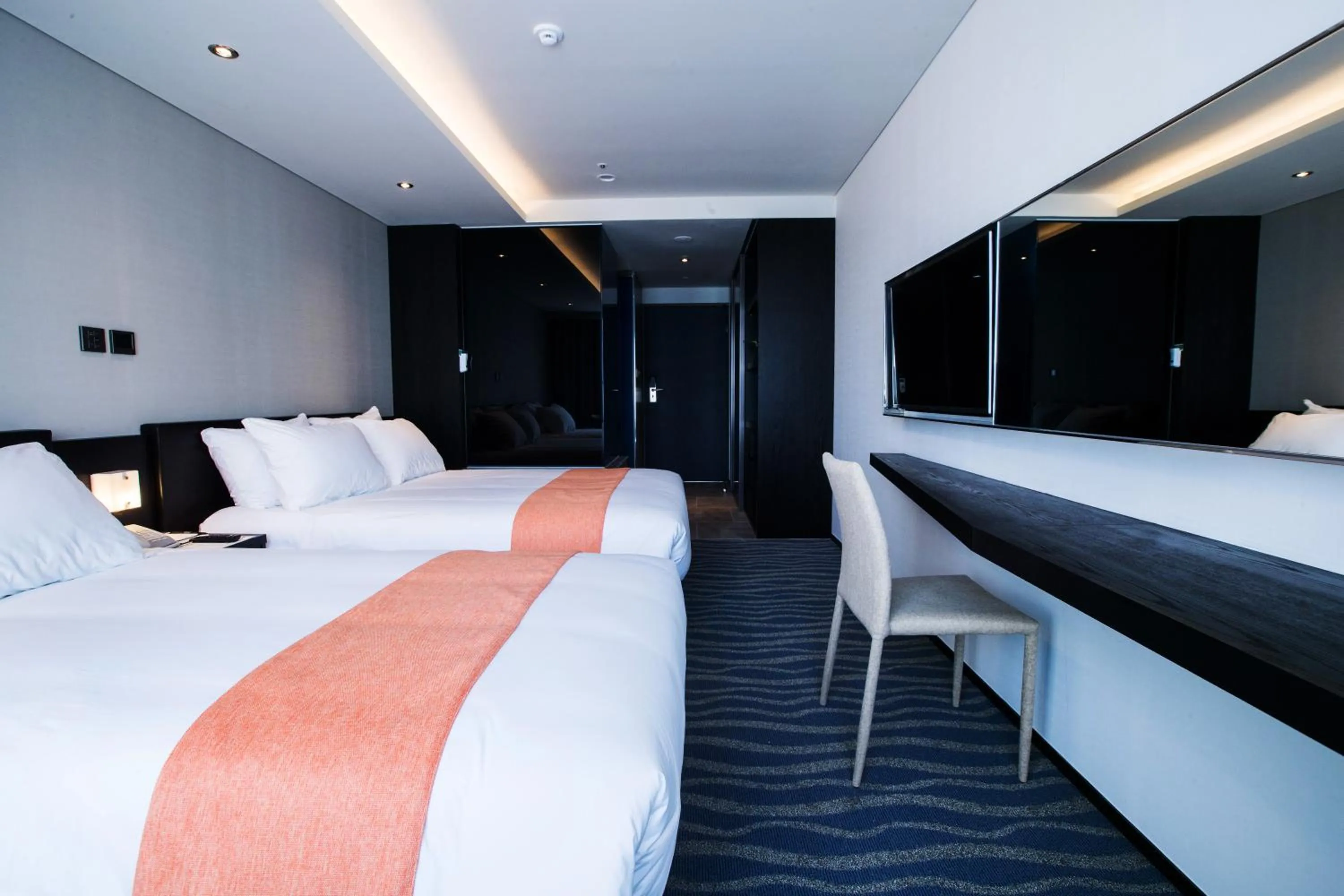 Bed in Gloucester Hotel Jeju