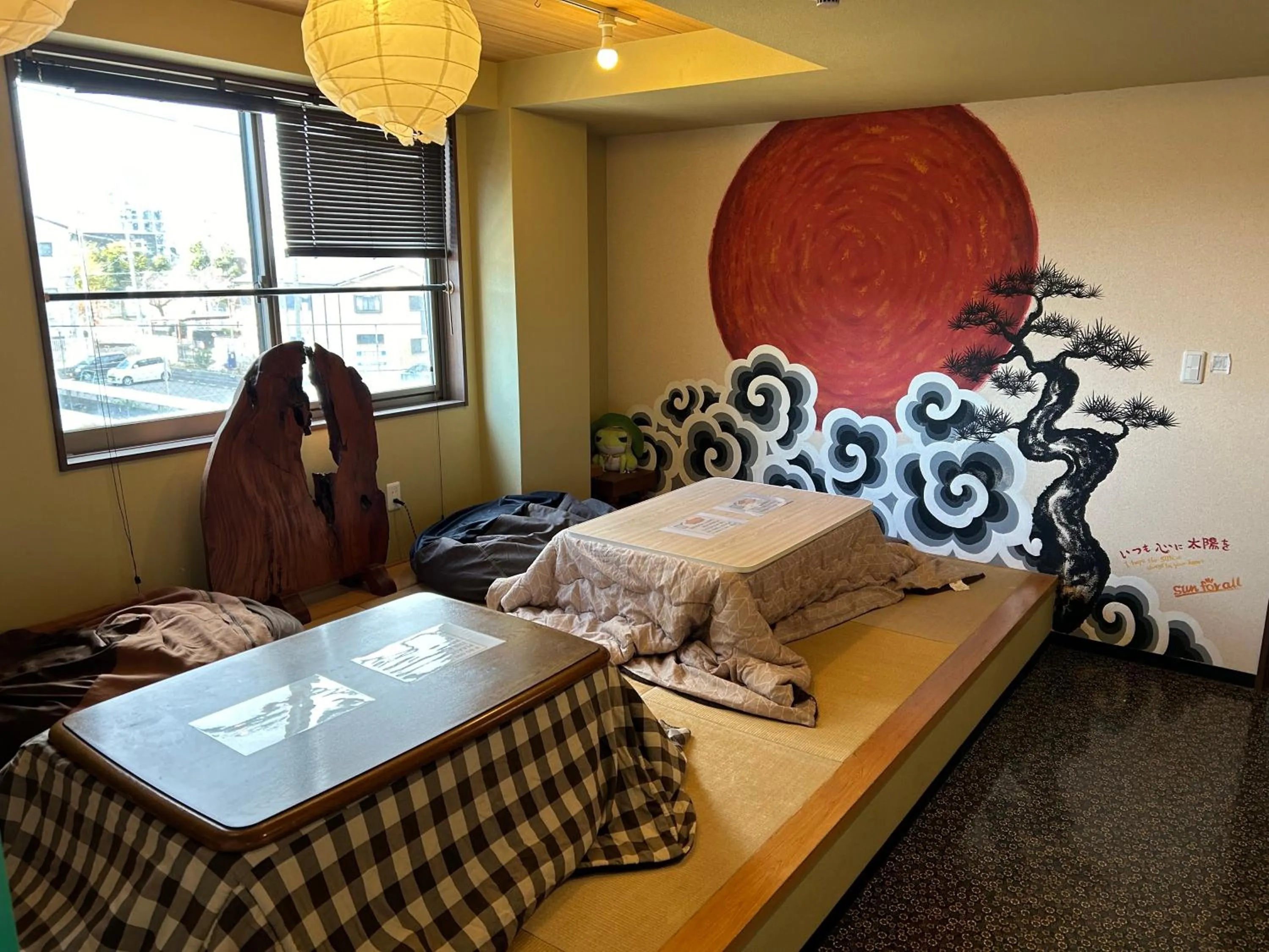 Communal lounge/ TV room, Bed in Guest House Matsu