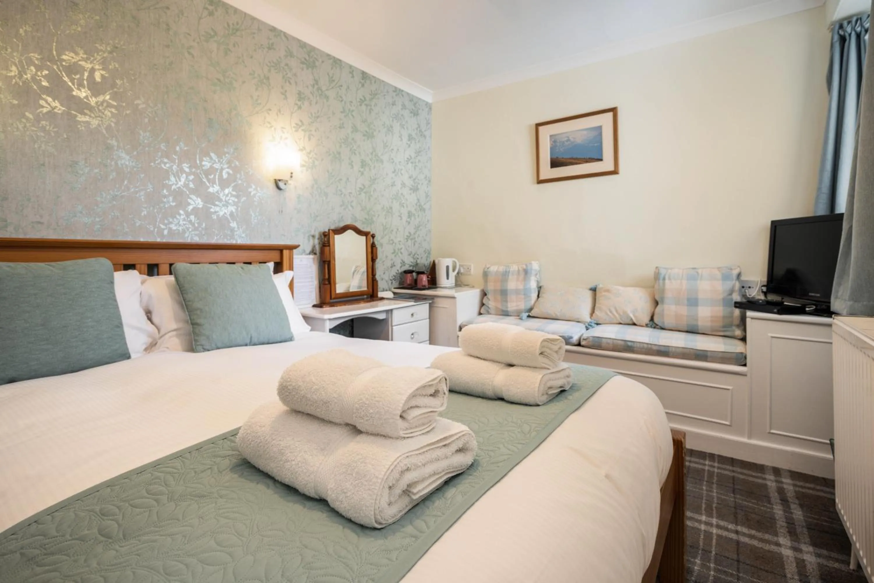 Bed in The Rowan Tree Country Hotel