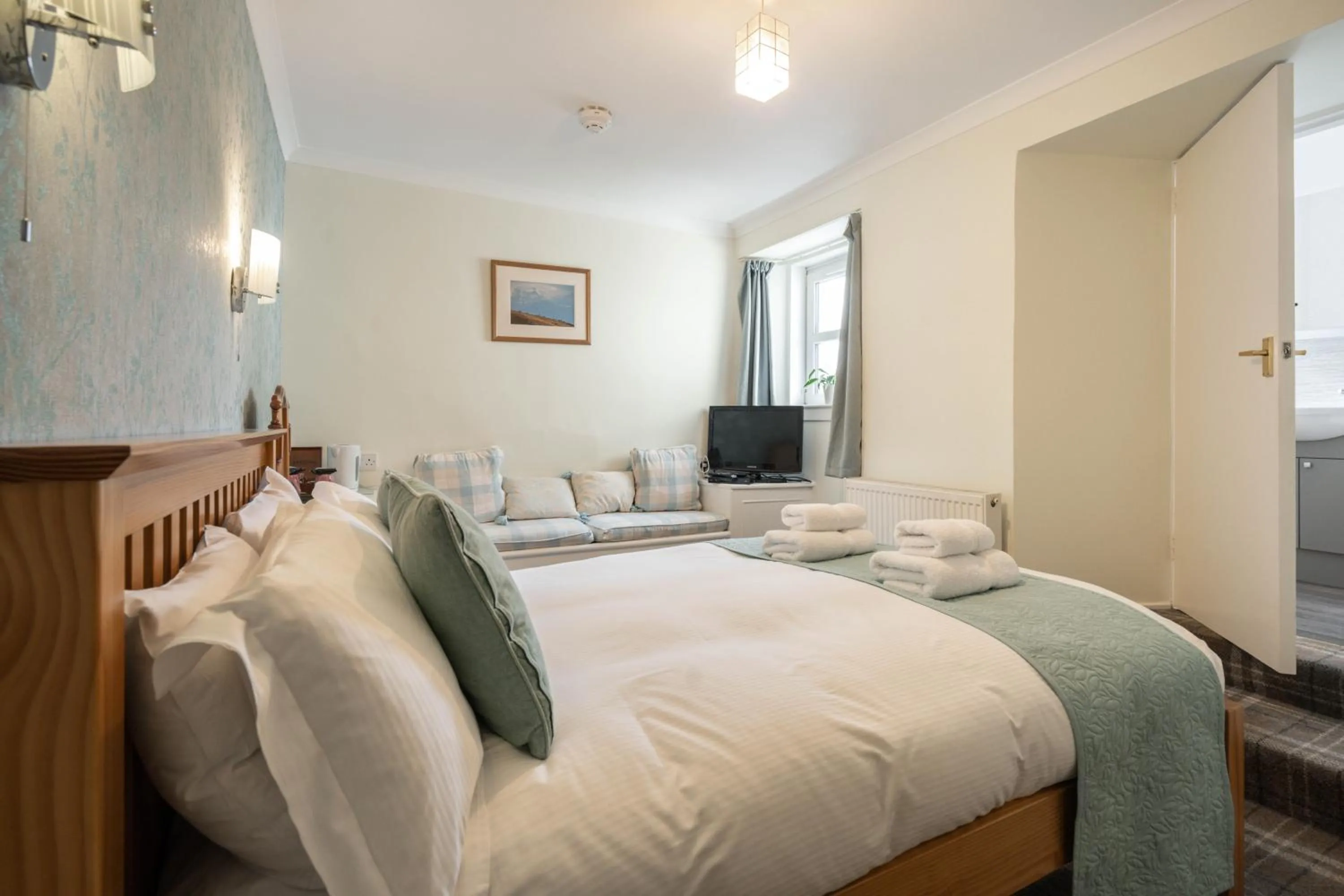 Bed in The Rowan Tree Country Hotel