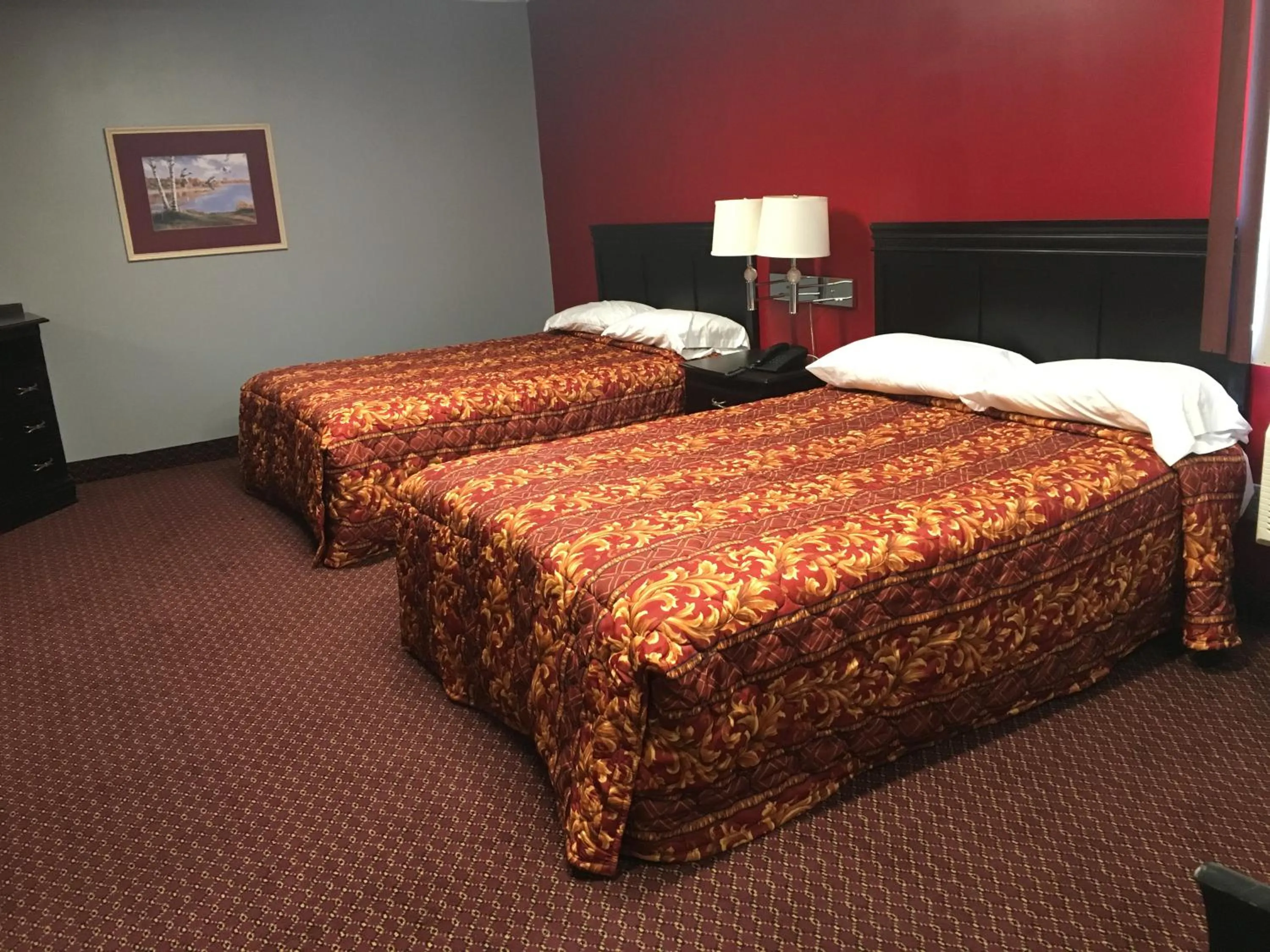 Bed in Haven Inn & Suites