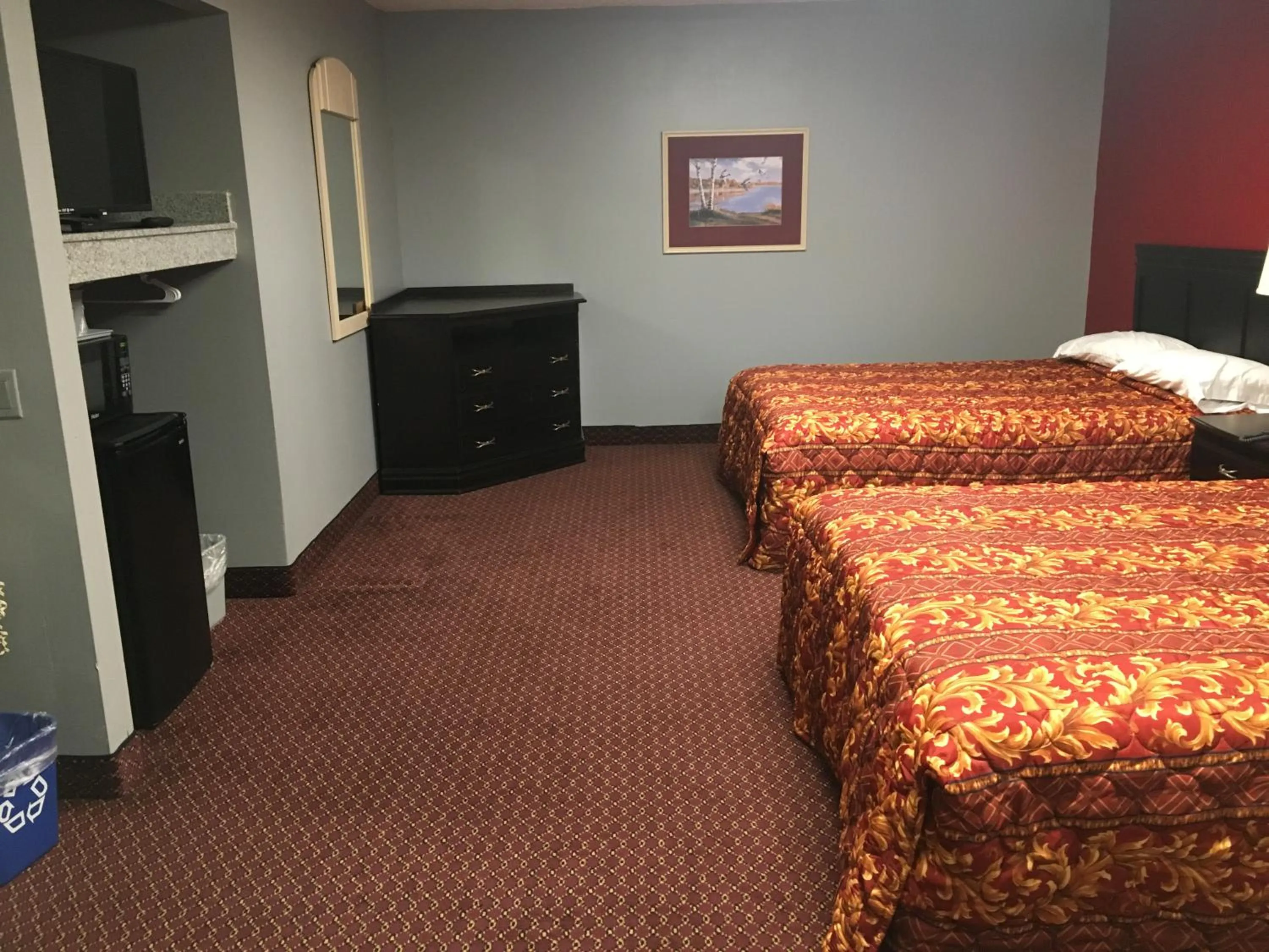 Bed in Haven Inn & Suites