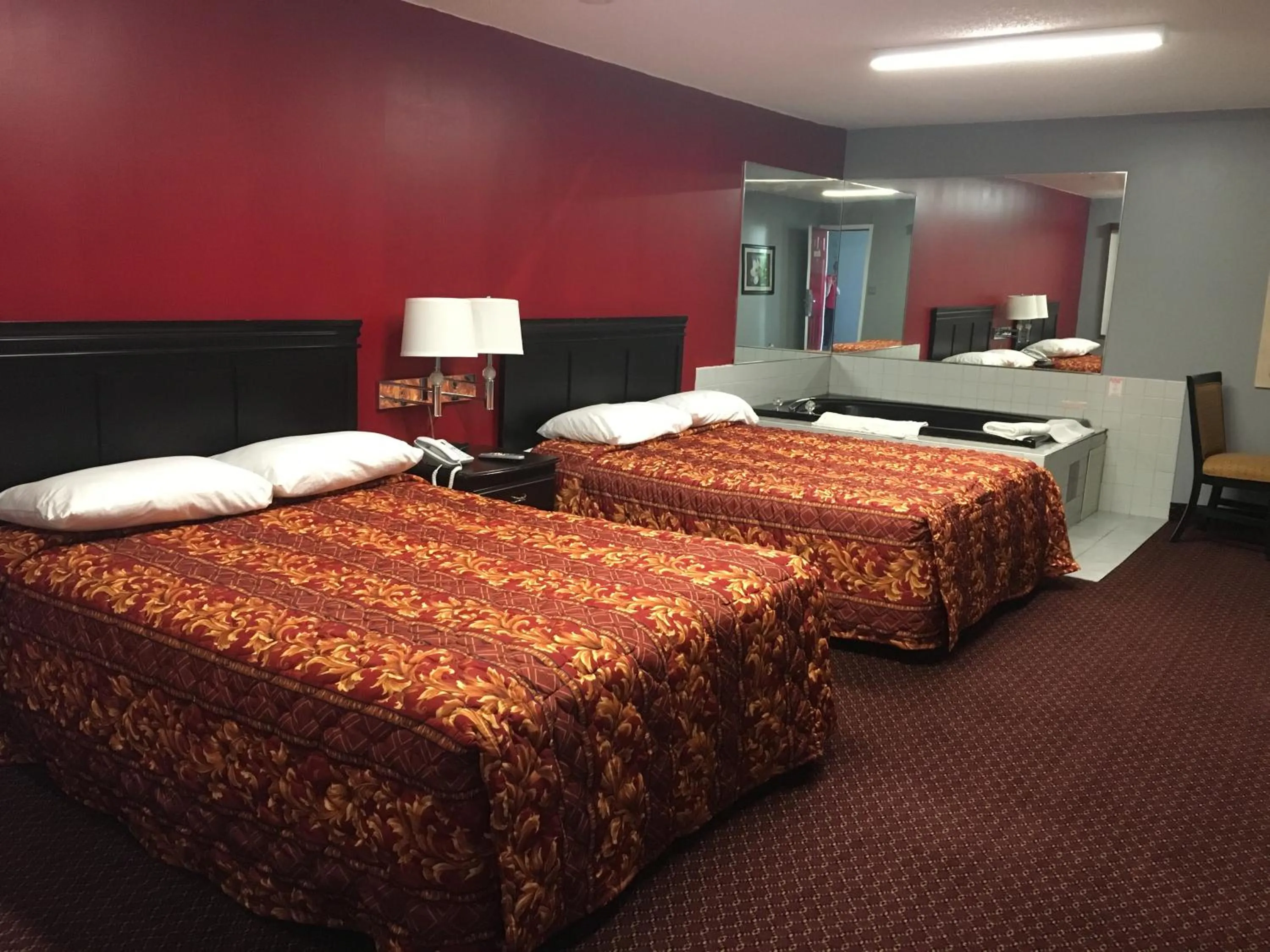 Bed in Haven Inn & Suites