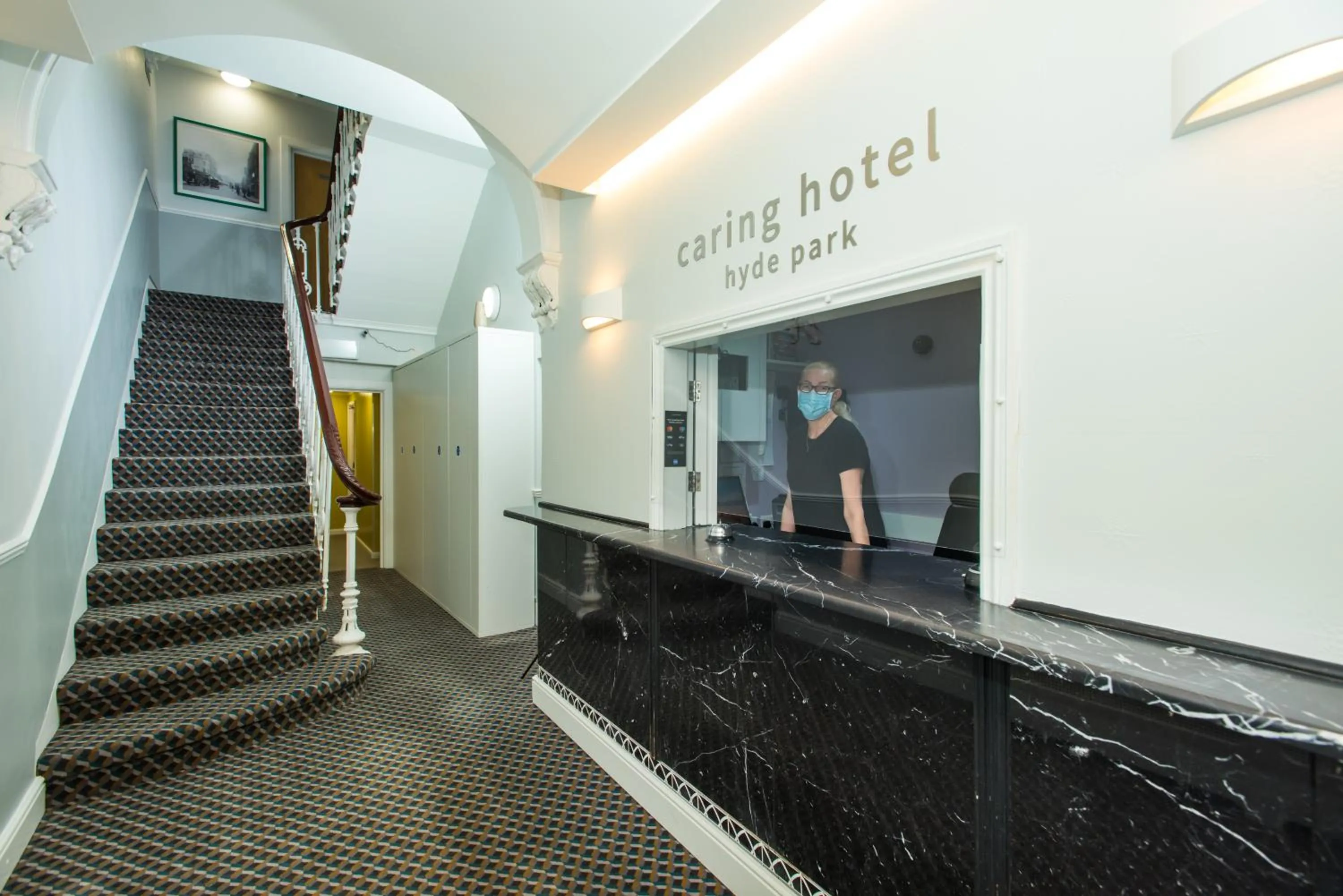 Lobby or reception in Caring Hotel