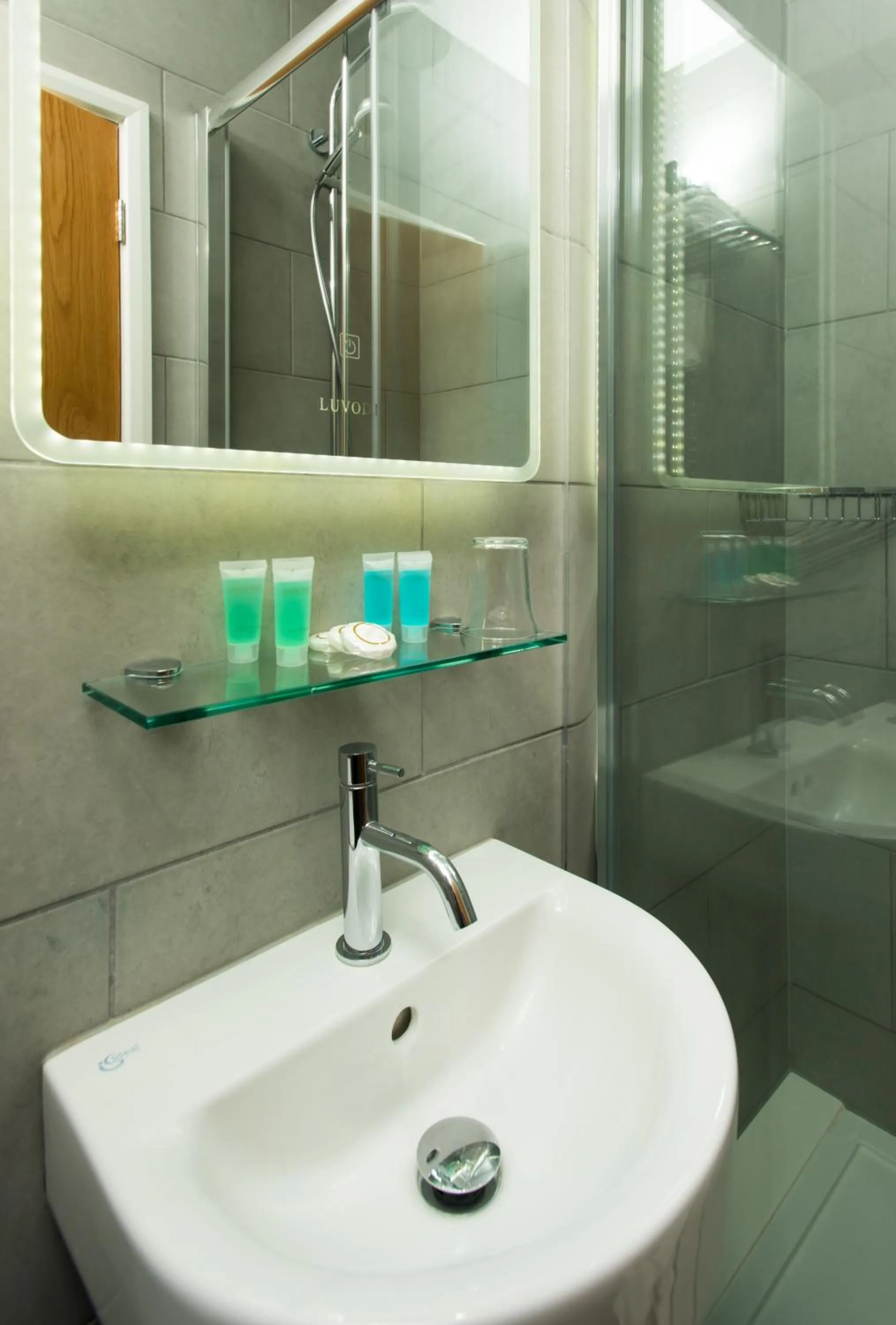 Bathroom in Caring Hotel