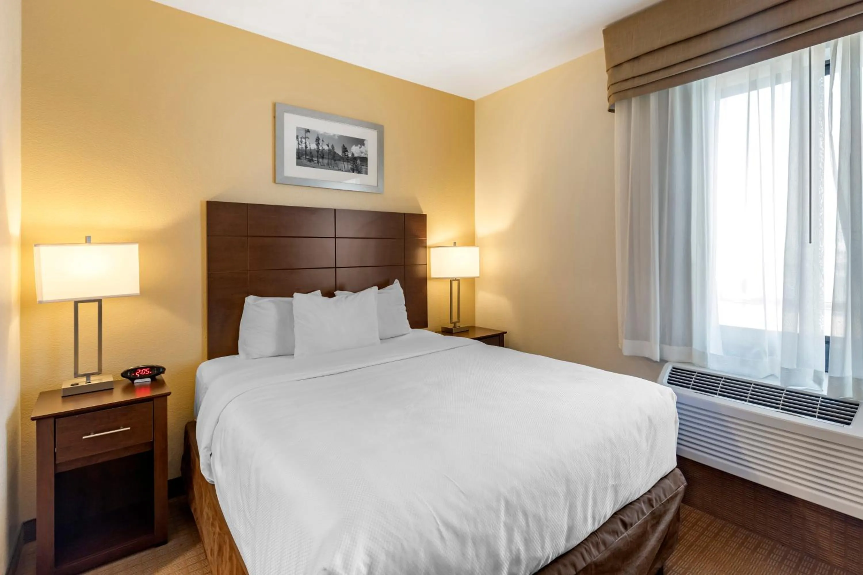 Bed in MainStay Suites Near Denver Downtown