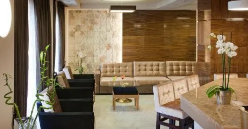 Living room in Dovitel Boutique Hotel