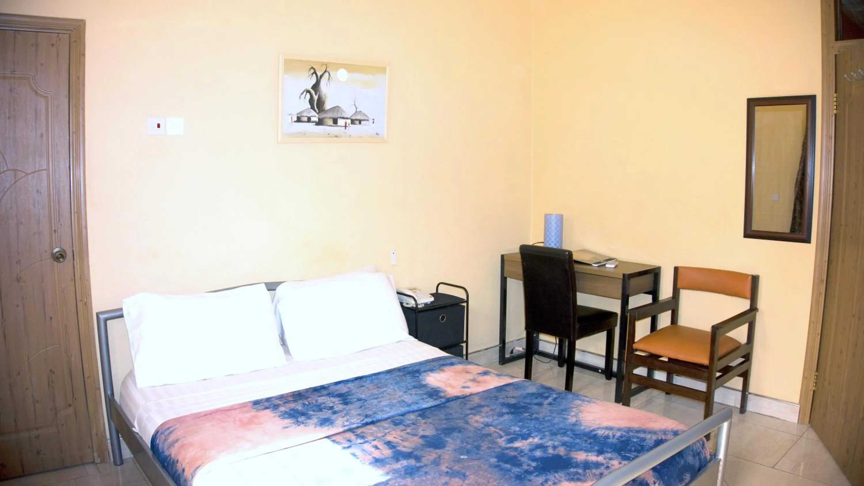 Seating area, Bed in Jesiwa B's Little Palace