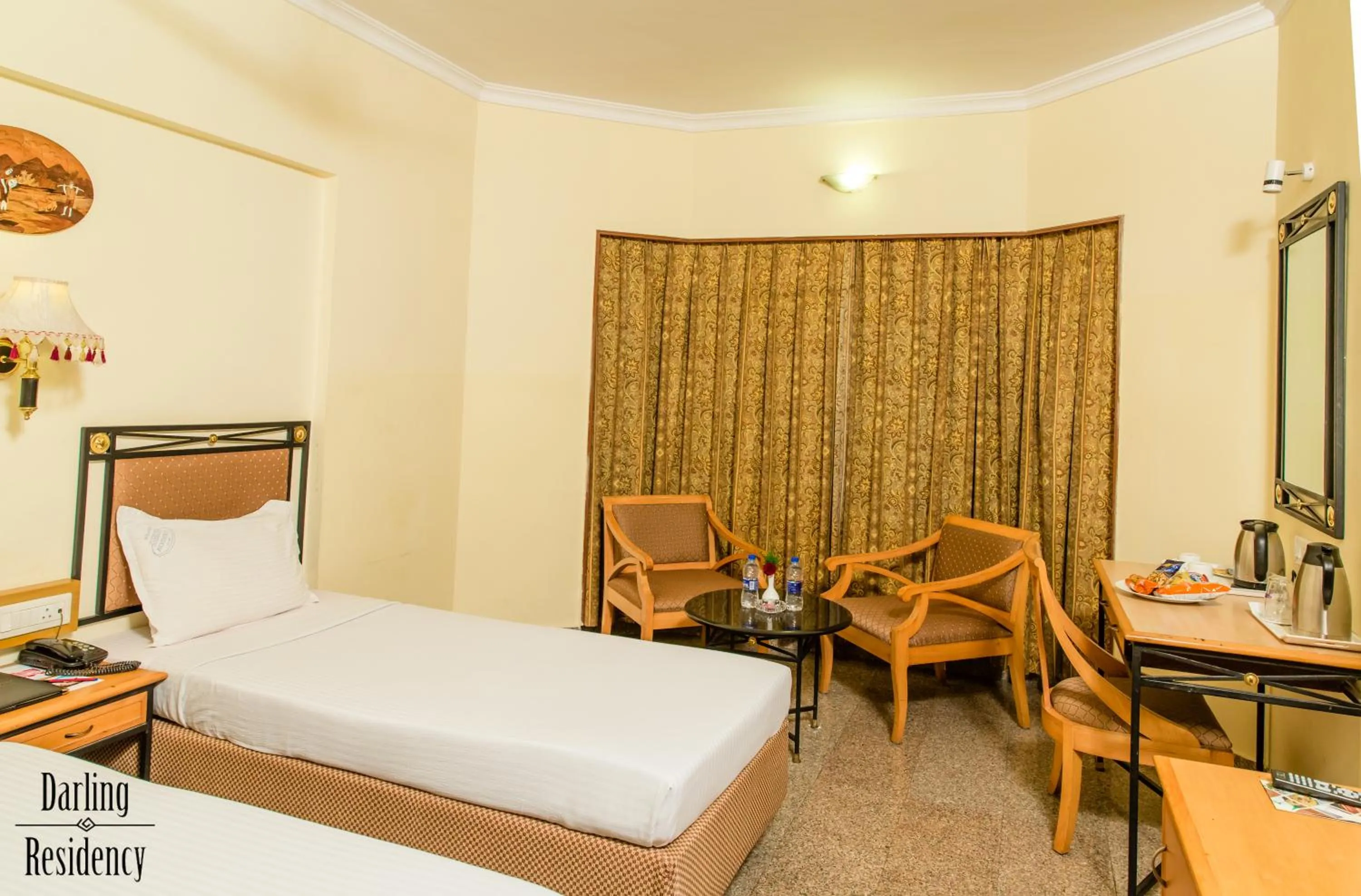 Photo of the whole room, Bed in Darling Residency