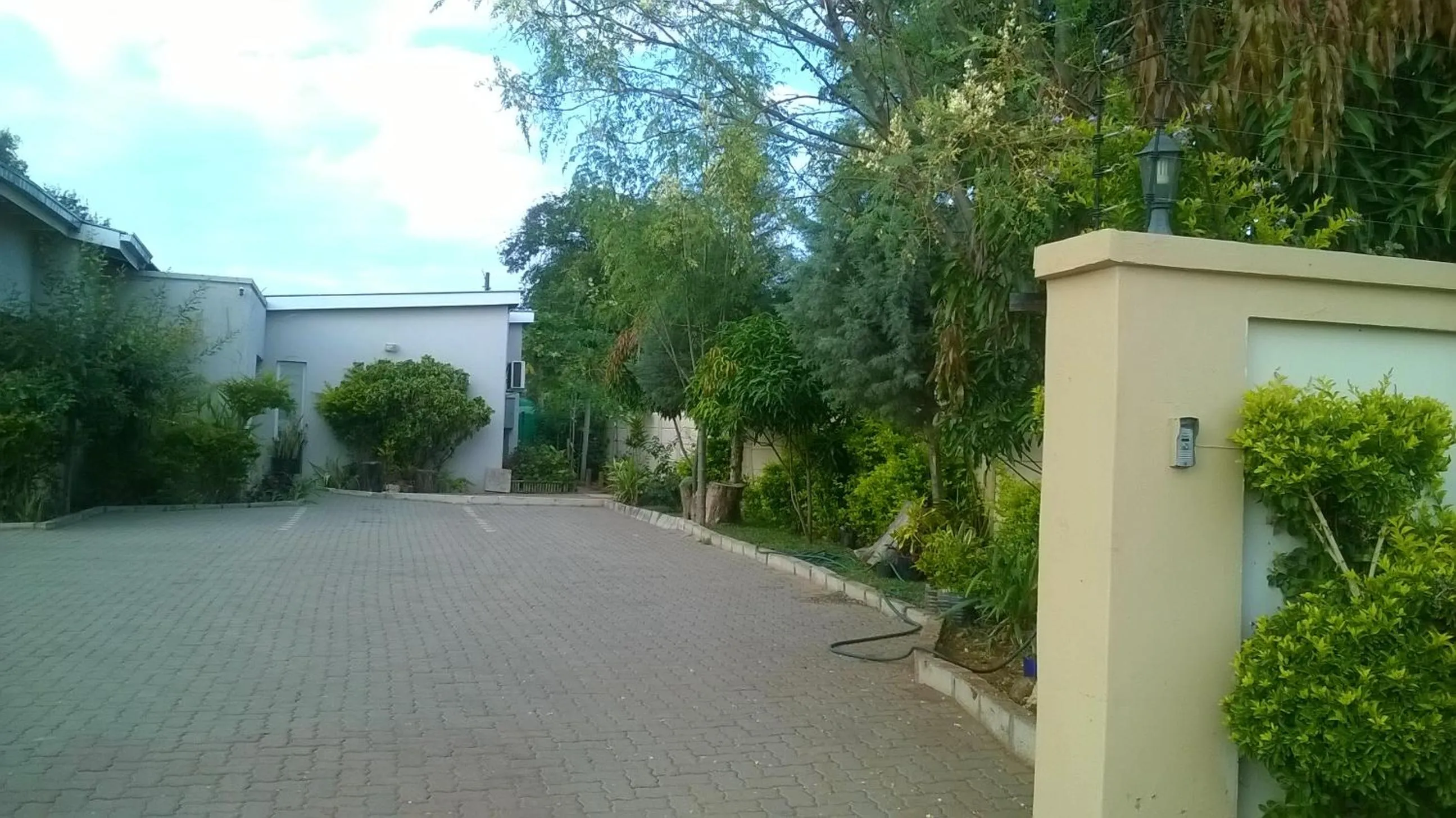 Garden in Comfort Palace Guest House Kasane