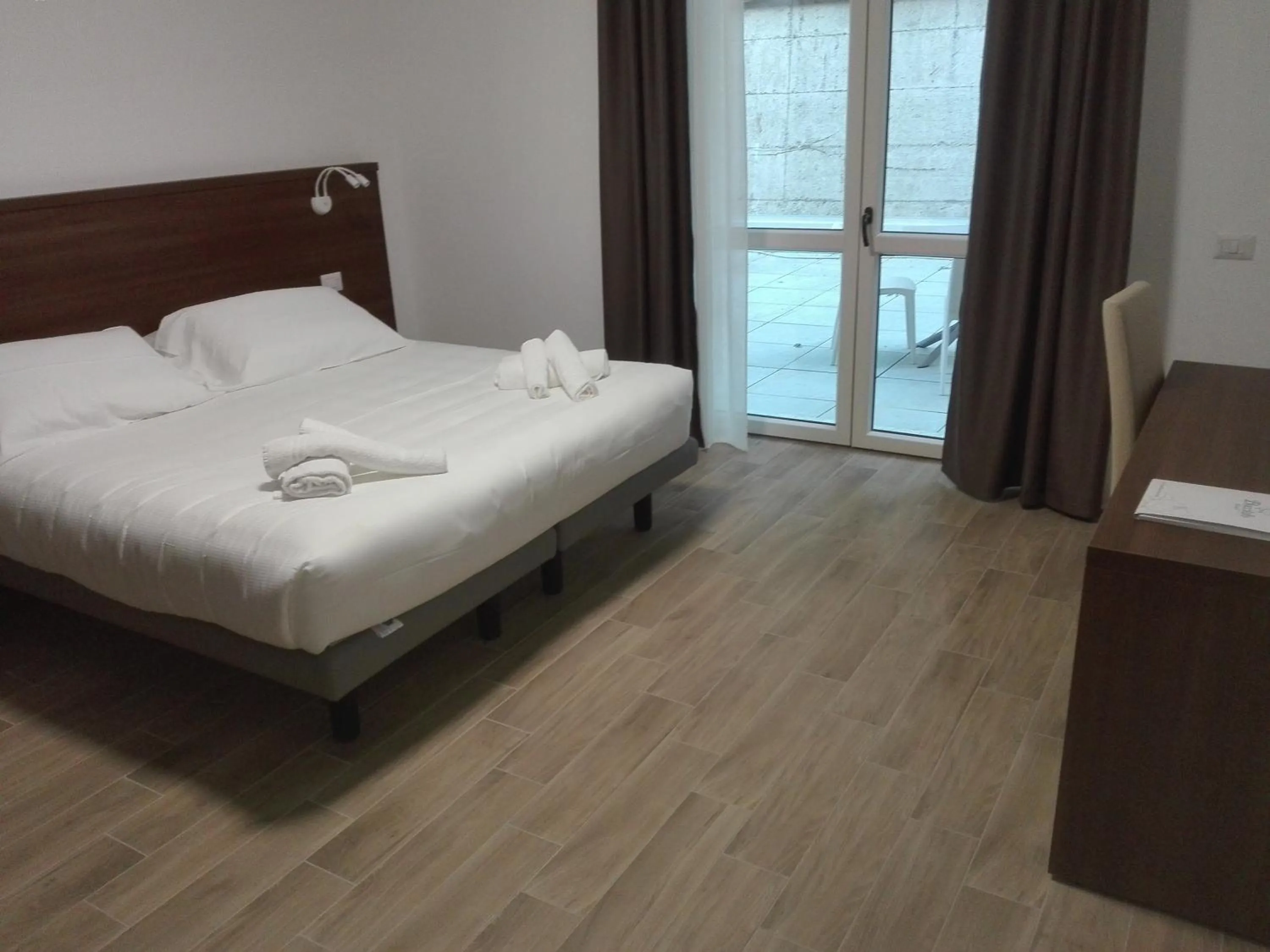 View (from property/room), Bed in Hotel Bocciolo