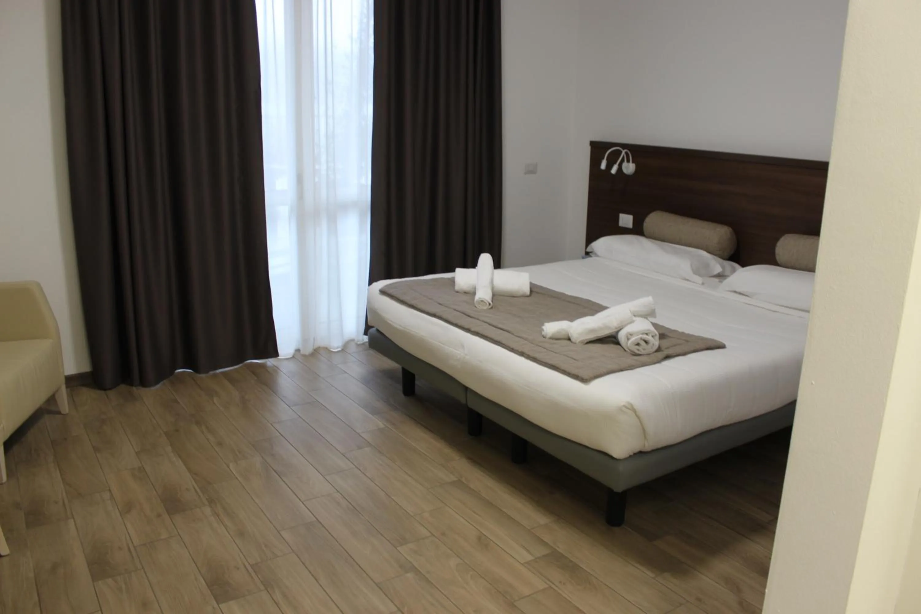 Decorative detail, Bed in Hotel Bocciolo