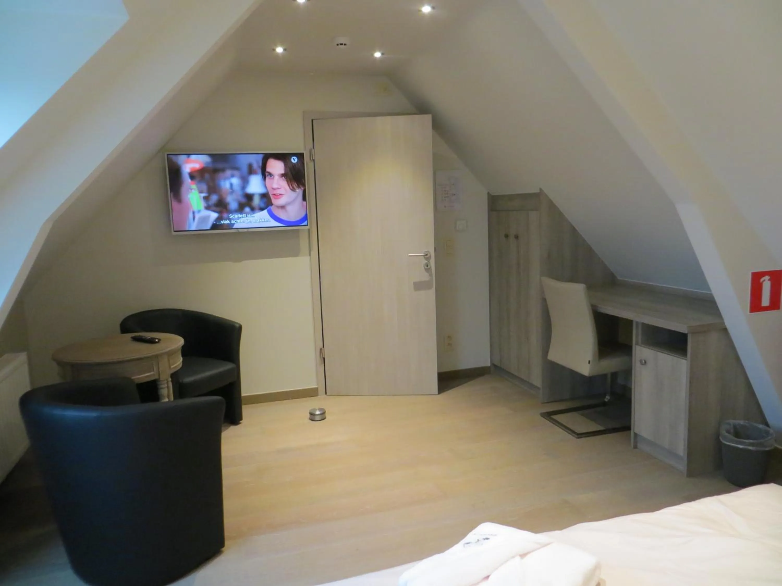 Seating area, Bed in B&B 't Hannonshof