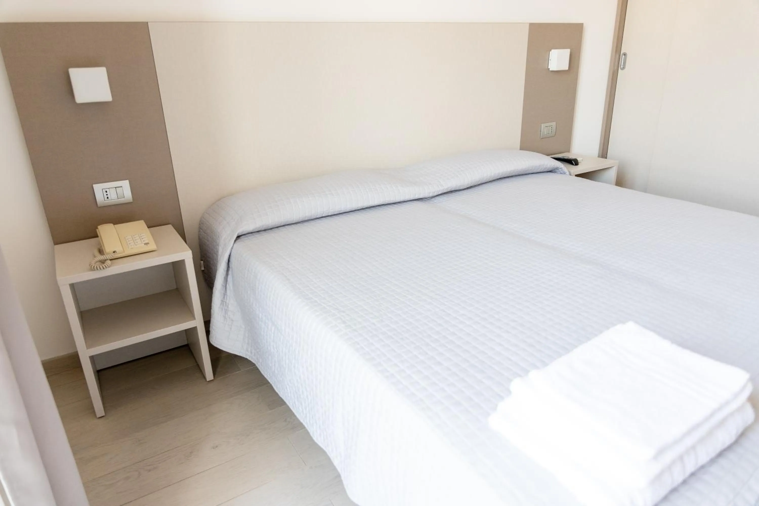 Bed in Hotel Capitano