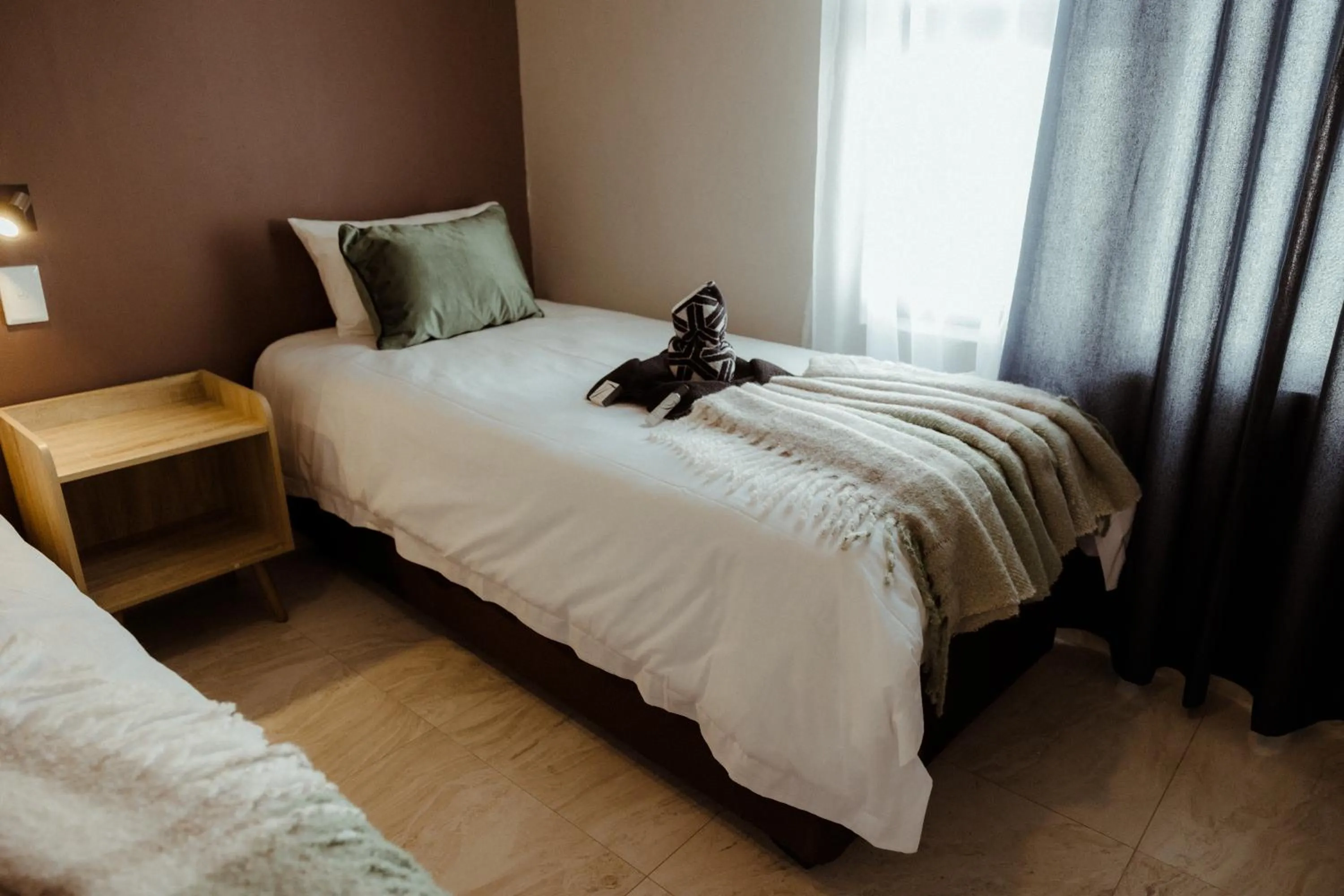 Bed in Out of Africa Town Lodge