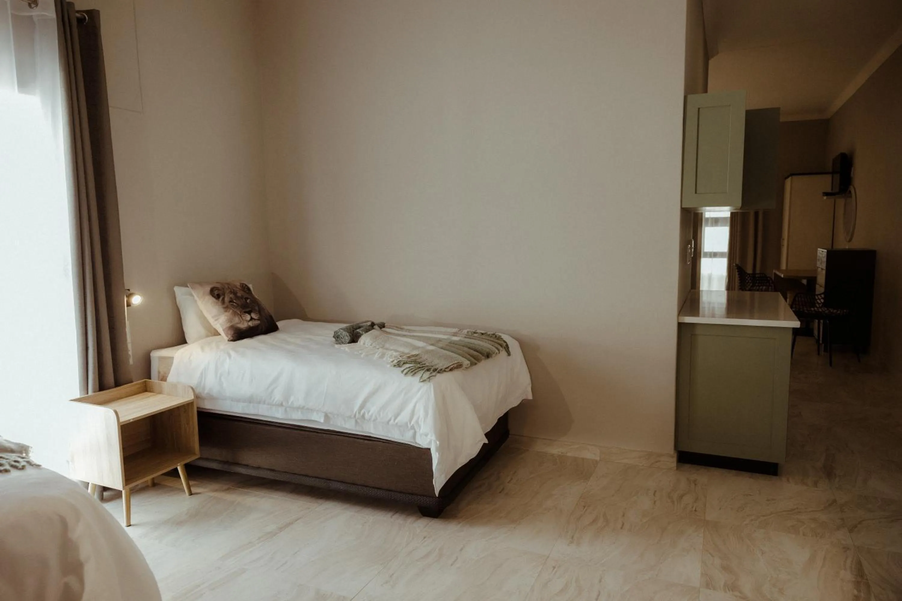 Bed in Out of Africa Town Lodge