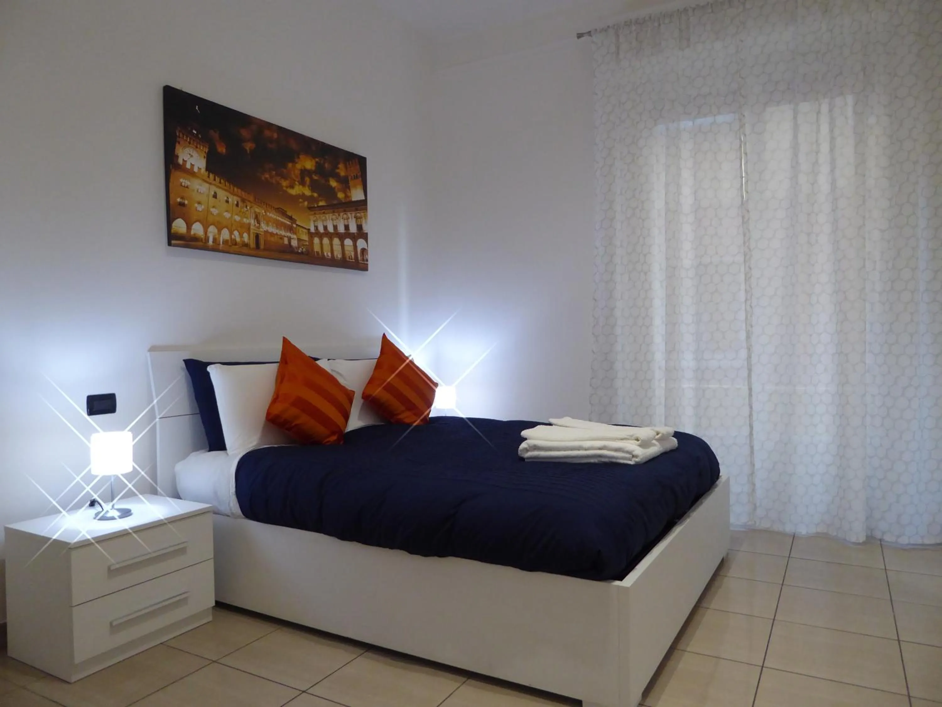 Photo of the whole room, Bed in Montebello House Bologna