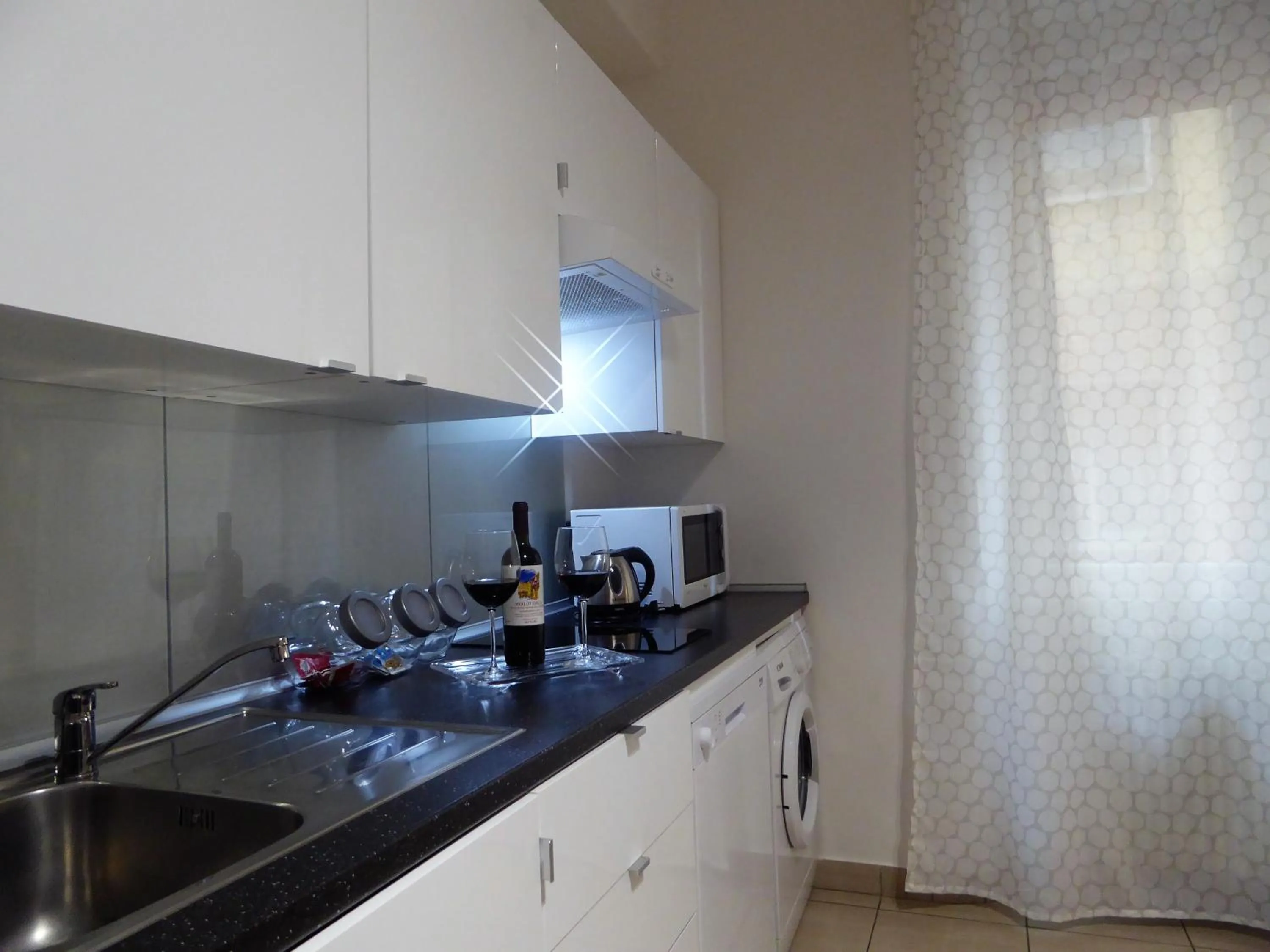 Kitchen or kitchenette in Montebello House Bologna