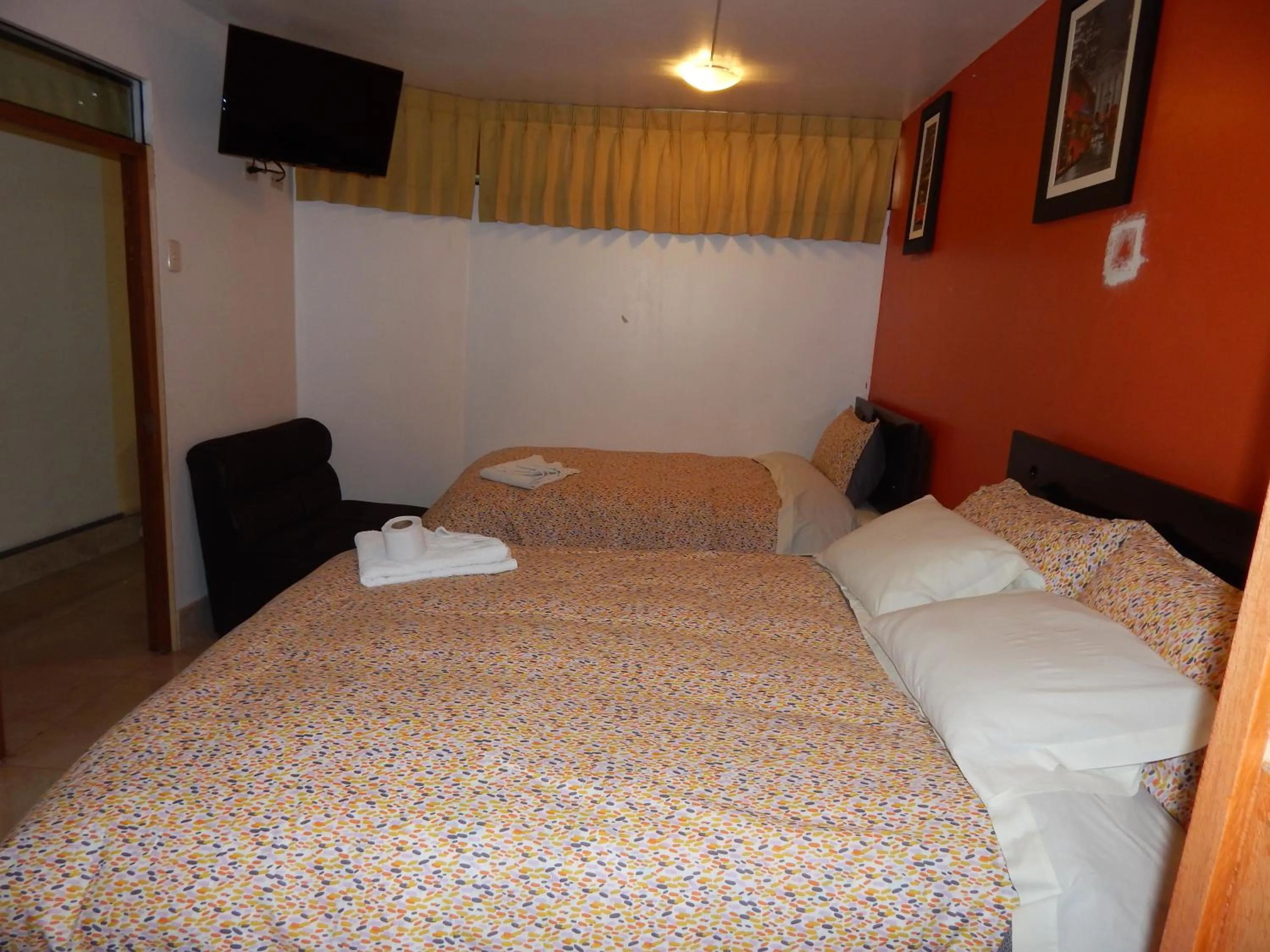 Bed in Hospedaje Qori Punku