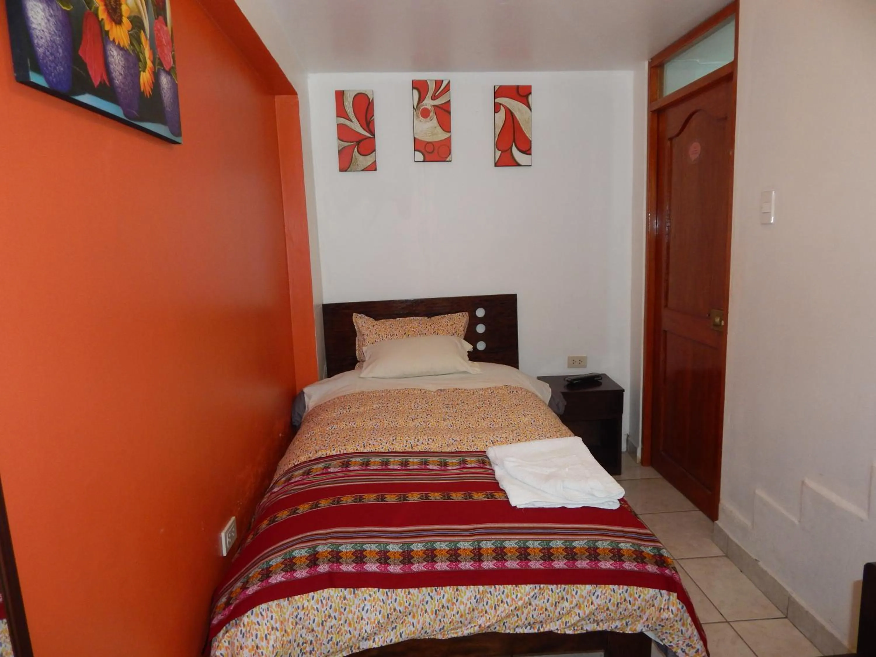 Bed in Hospedaje Qori Punku