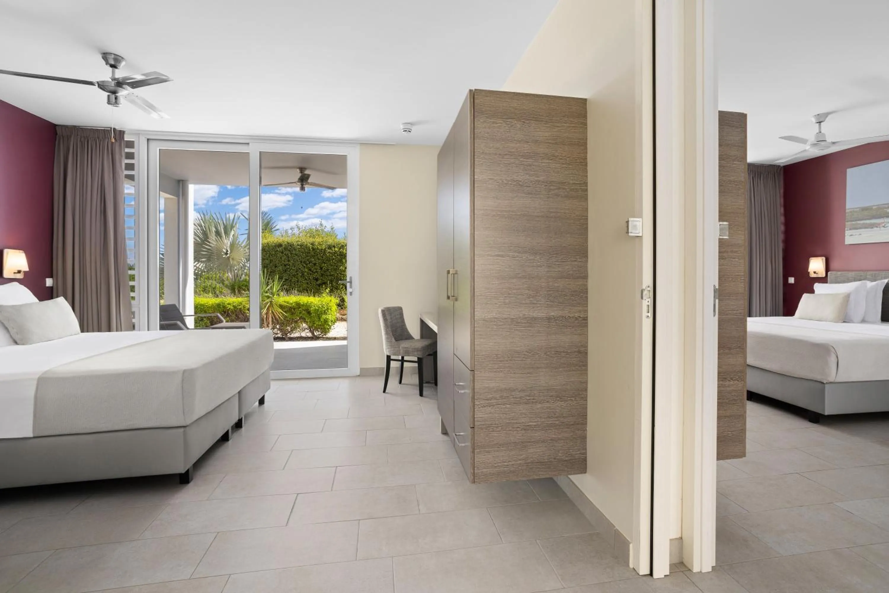 Bed in Delfins Beach Resort Bonaire, Tapestry Collection by Hilton