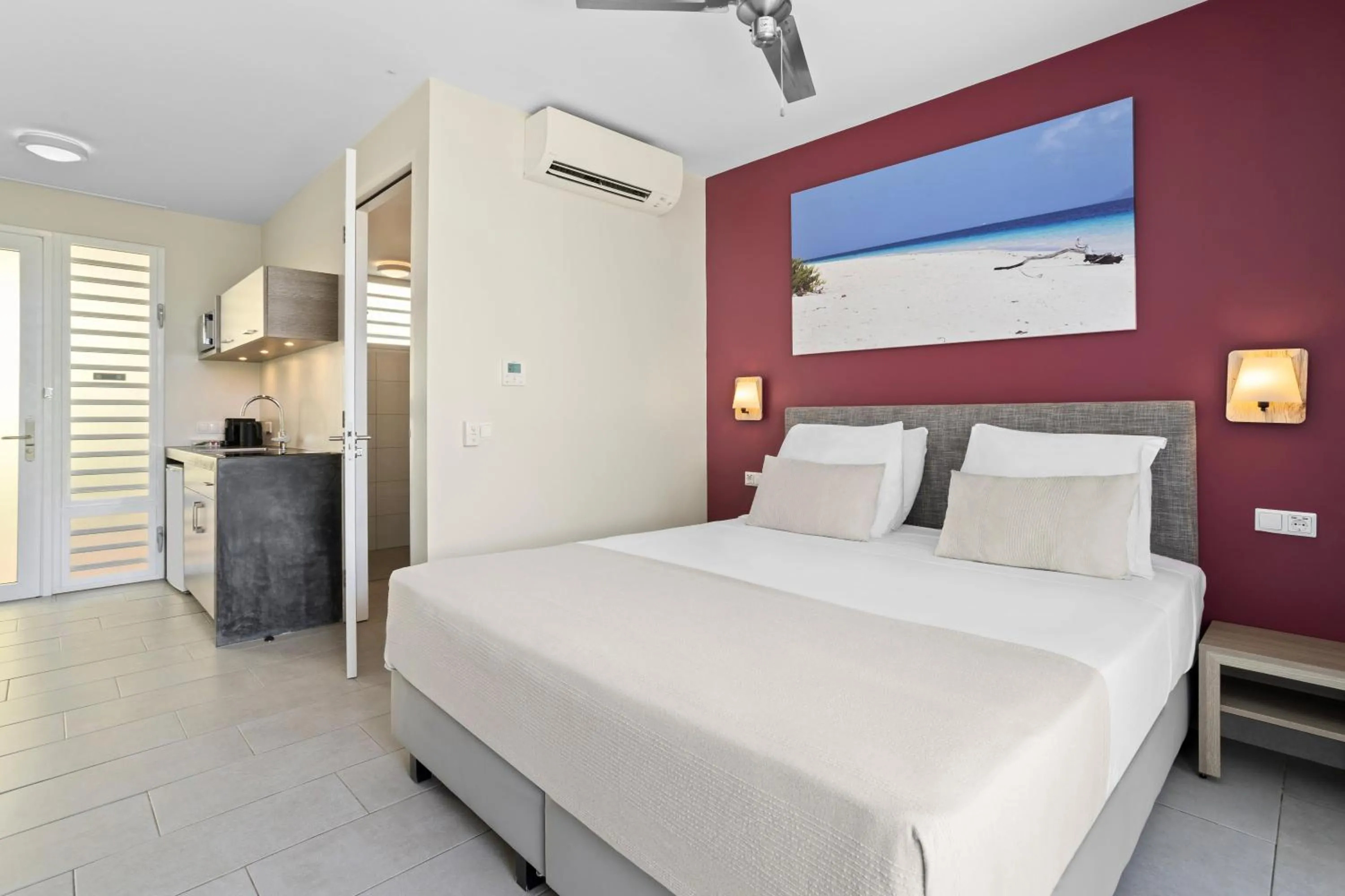 Bed in Delfins Beach Resort Bonaire, Tapestry Collection by Hilton