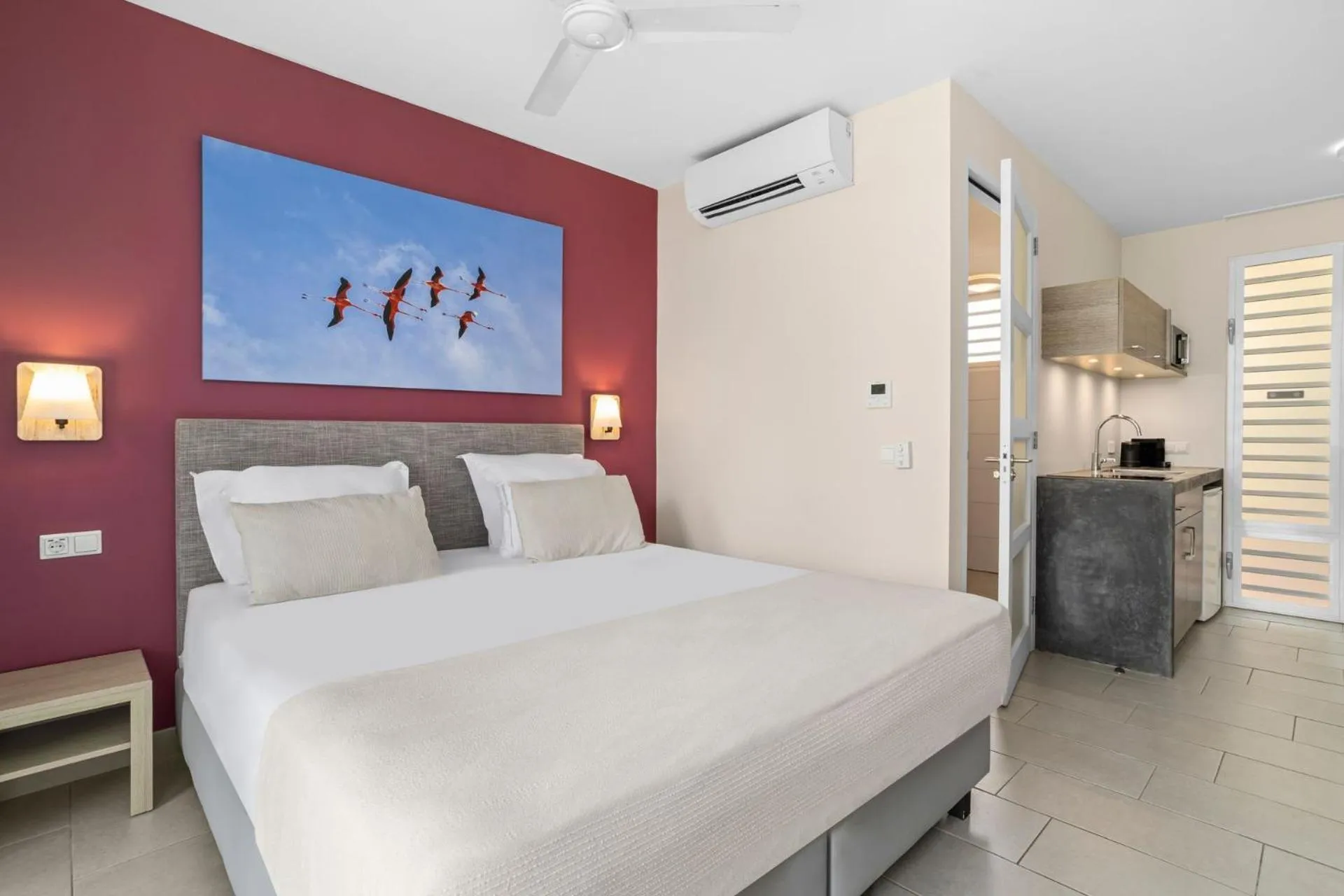Bed in Delfins Beach Resort Bonaire, Tapestry Collection by Hilton