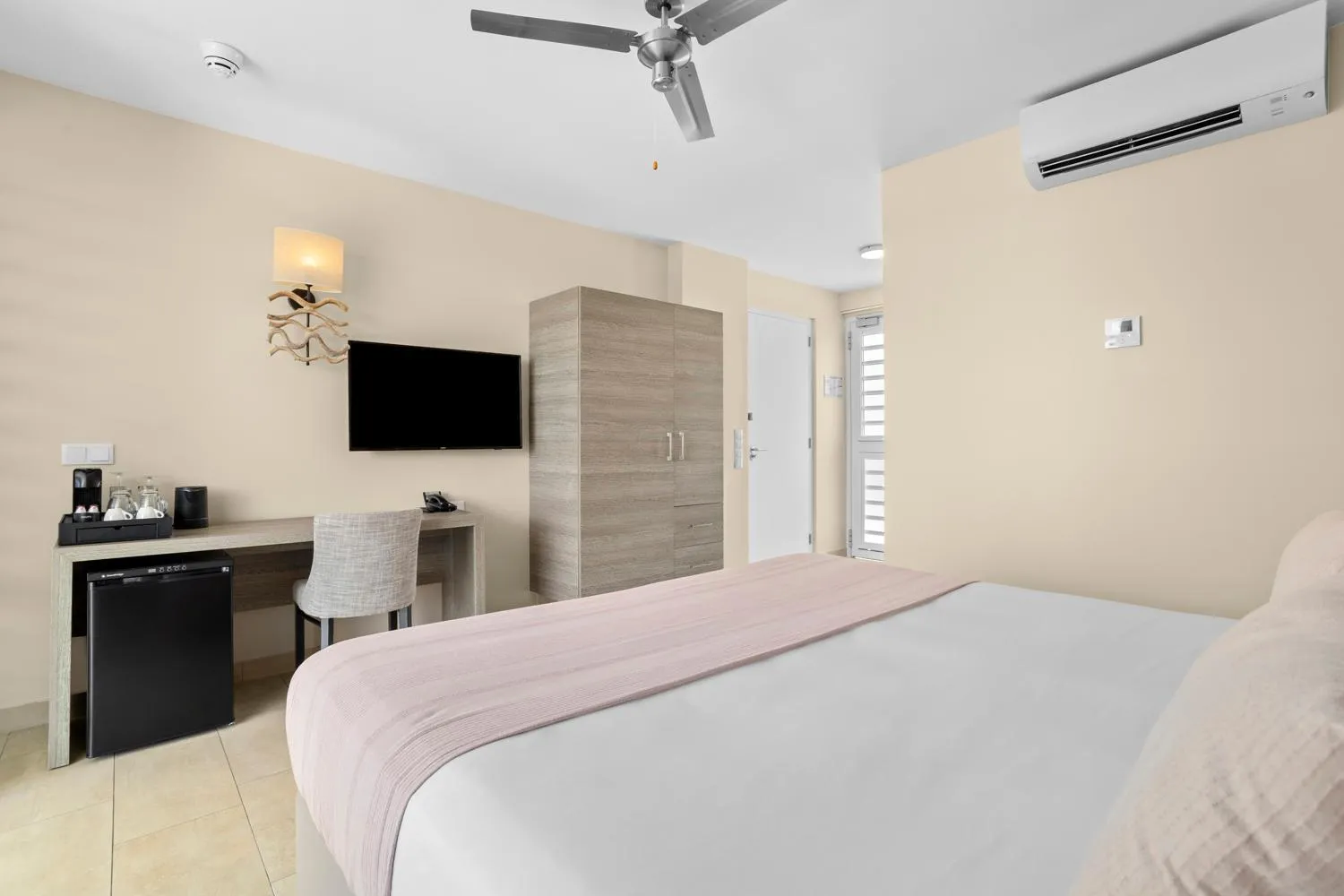 Bed in Delfins Beach Resort Bonaire, Tapestry Collection by Hilton
