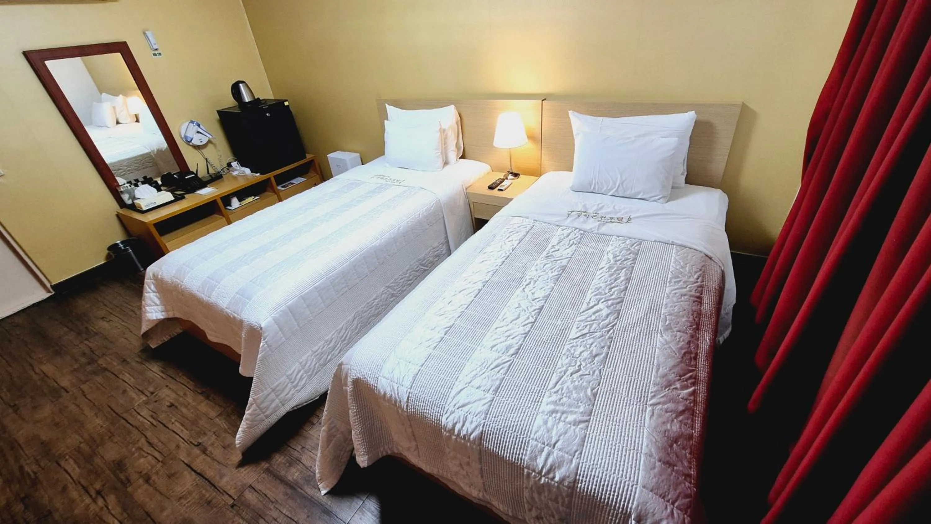 Bed in Kyungha Spa Hotel