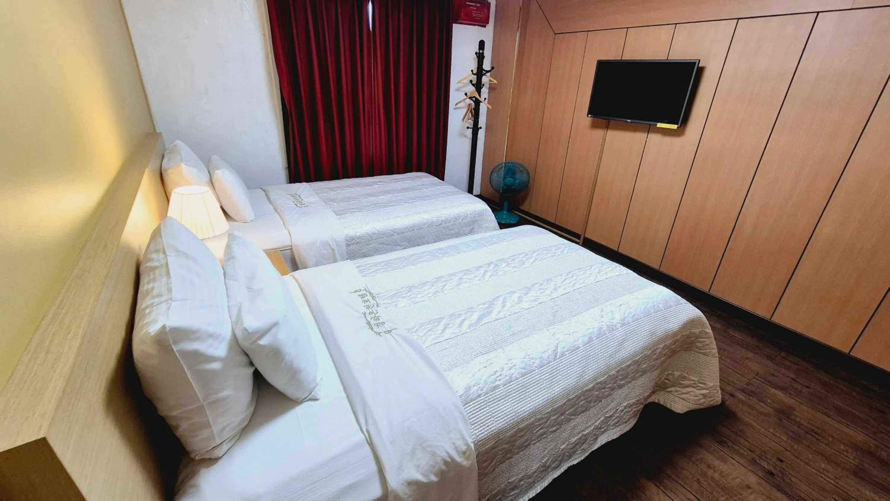 Bed in Kyungha Spa Hotel
