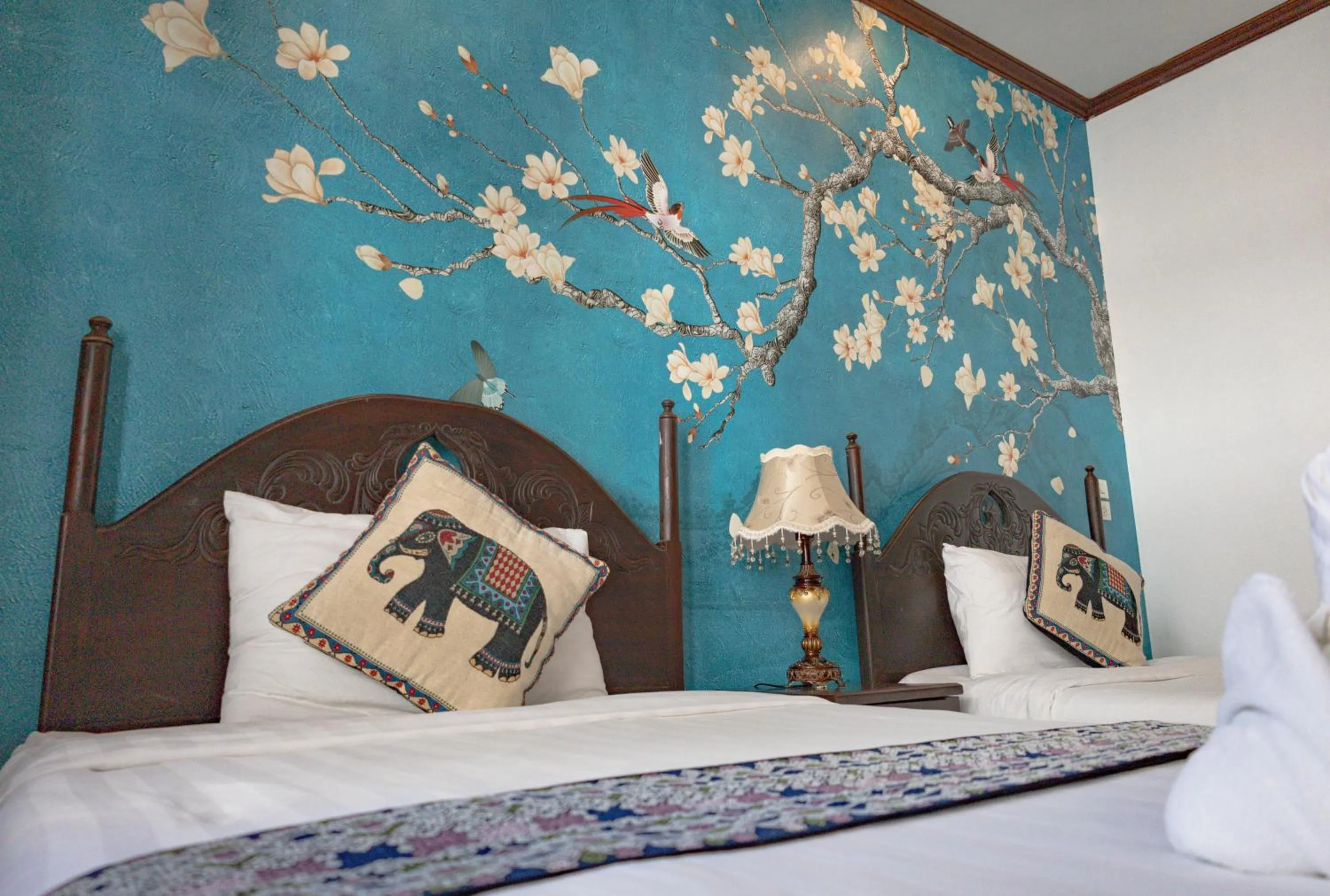 Bed in Jasmine Luangprabang Hotel